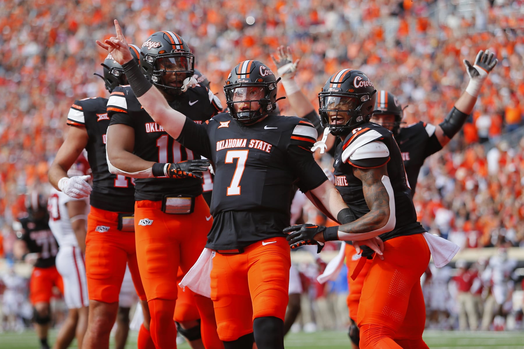 STILLWATER, OK - NOVEMBER 4:  Quarterback Alan Bowman #7 of the Oklahoma State Cowboys celebrates his 13-yard touchdown run against the Oklahoma Sooners in the second quarter of Bedlam at Boone Pickens Stadium on November 4, 2023 in Stillwater, Oklahoma.  (Photo by Brian Bahr/Getty Images)
