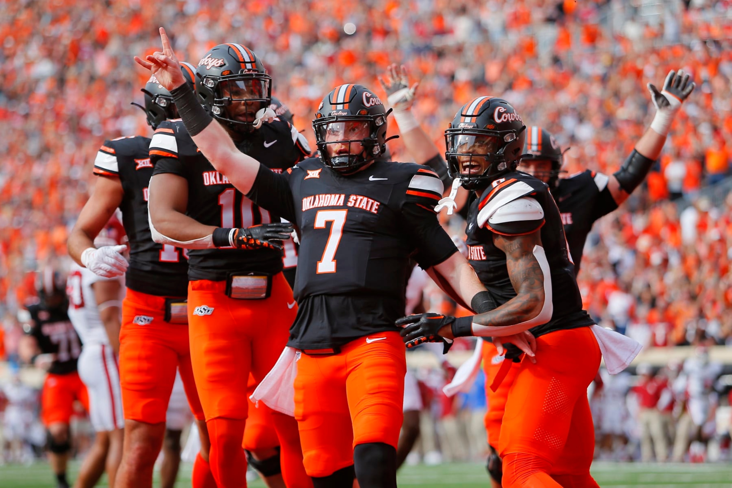 STILLWATER, OK - NOVEMBER 4: Quarterback Alan Bowman #7 of the Oklahoma State Cowboys celebrates his 13-yard touchdown run against the Oklahoma Sooners in the second quarter of Bedlam at Boone Pickens Stadium on November 4, 2023 in Stillwater, Oklahoma. (Photo by Brian Bahr/Getty Images) STILLWATER, OK - NOVEMBER 4: Quarterback Alan Bowman #7 of the Oklahoma State Cowboys celebrates his 13-yard touchdown run against the Oklahoma Sooners in the second quarter of Bedlam at Boone Pickens Stadium on November 4, 2023 in Stillwater, Oklahoma. (Photo by Brian Bahr/Getty Images)