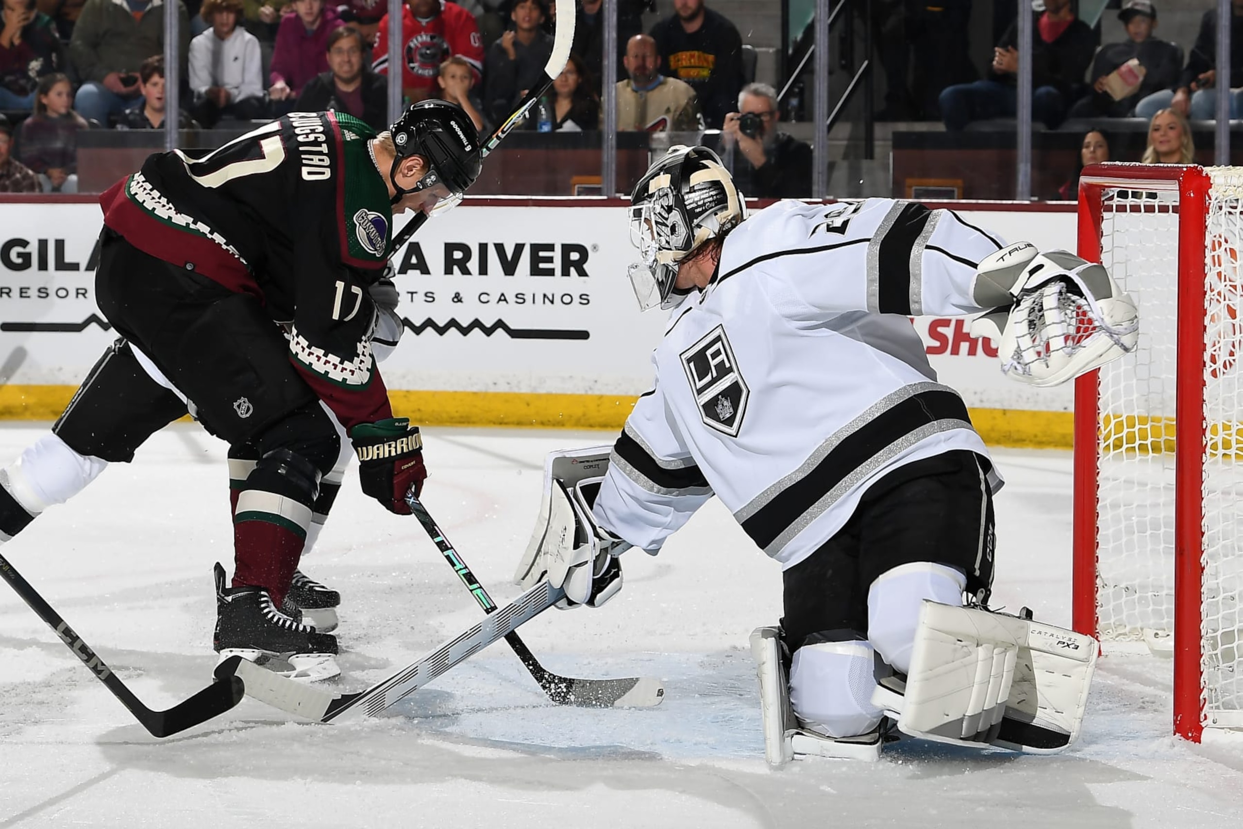 TEMPE, ARIZONA - NOVEMBER 20: Pheonix Copley #29 of the Los Angeles Kings looks back towards a shot attempt by Nick Bjugstad #17 of the Arizona Coyotes during the first period of the game at Mullett Arena on November 20, 2023 in Tempe, Arizona. (Photo by Norm Hall/NHLI via Getty Images)