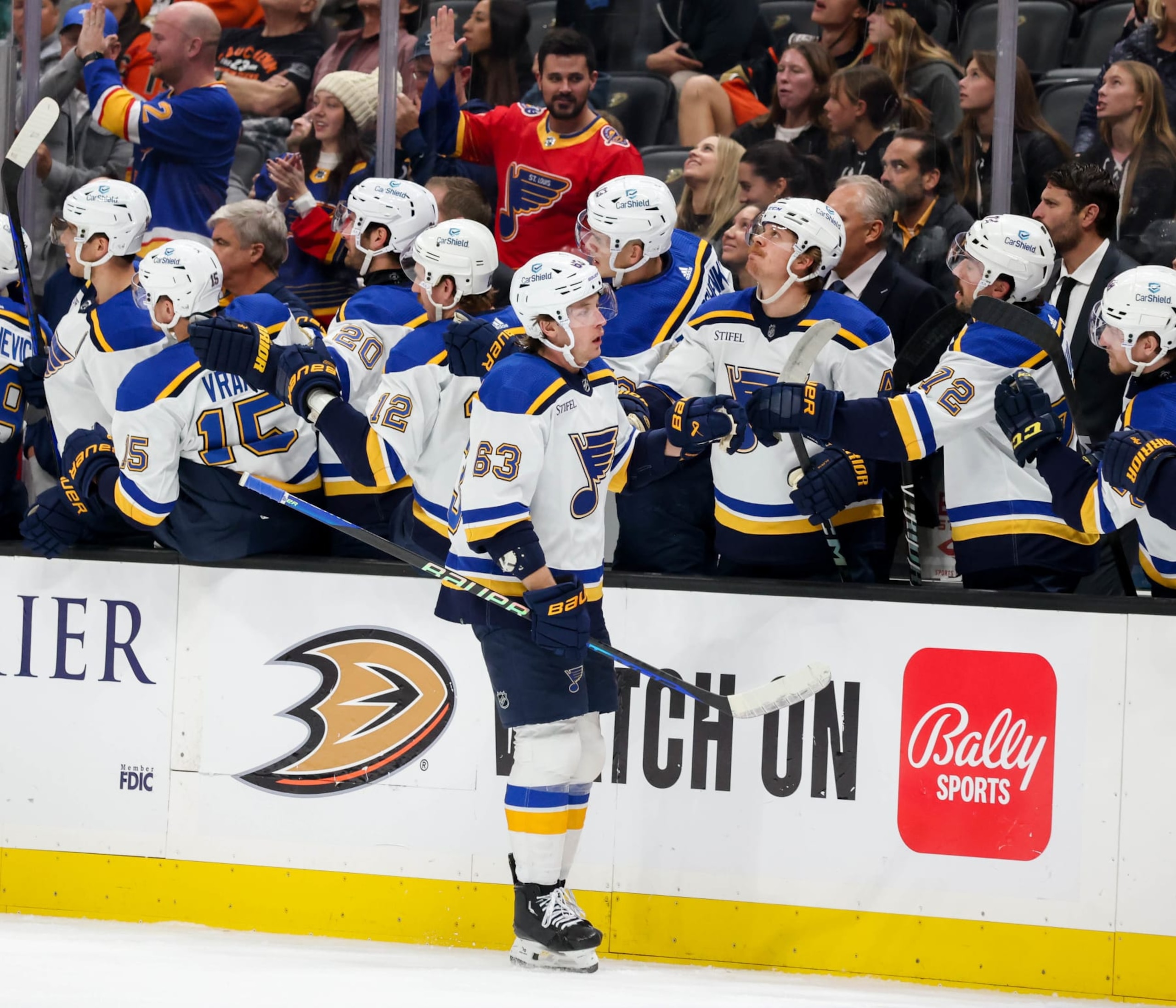 ANAHEIM, CA - NOVEMBER 19:  Jake Neighbours #63 of the St. Louis Blues celebrate his goal with teammates during the first period against the Anaheim Ducks at Honda Center on November 19, 2023 in Anaheim, California. (Photo by Debora Robinson/NHLI via Getty Images)