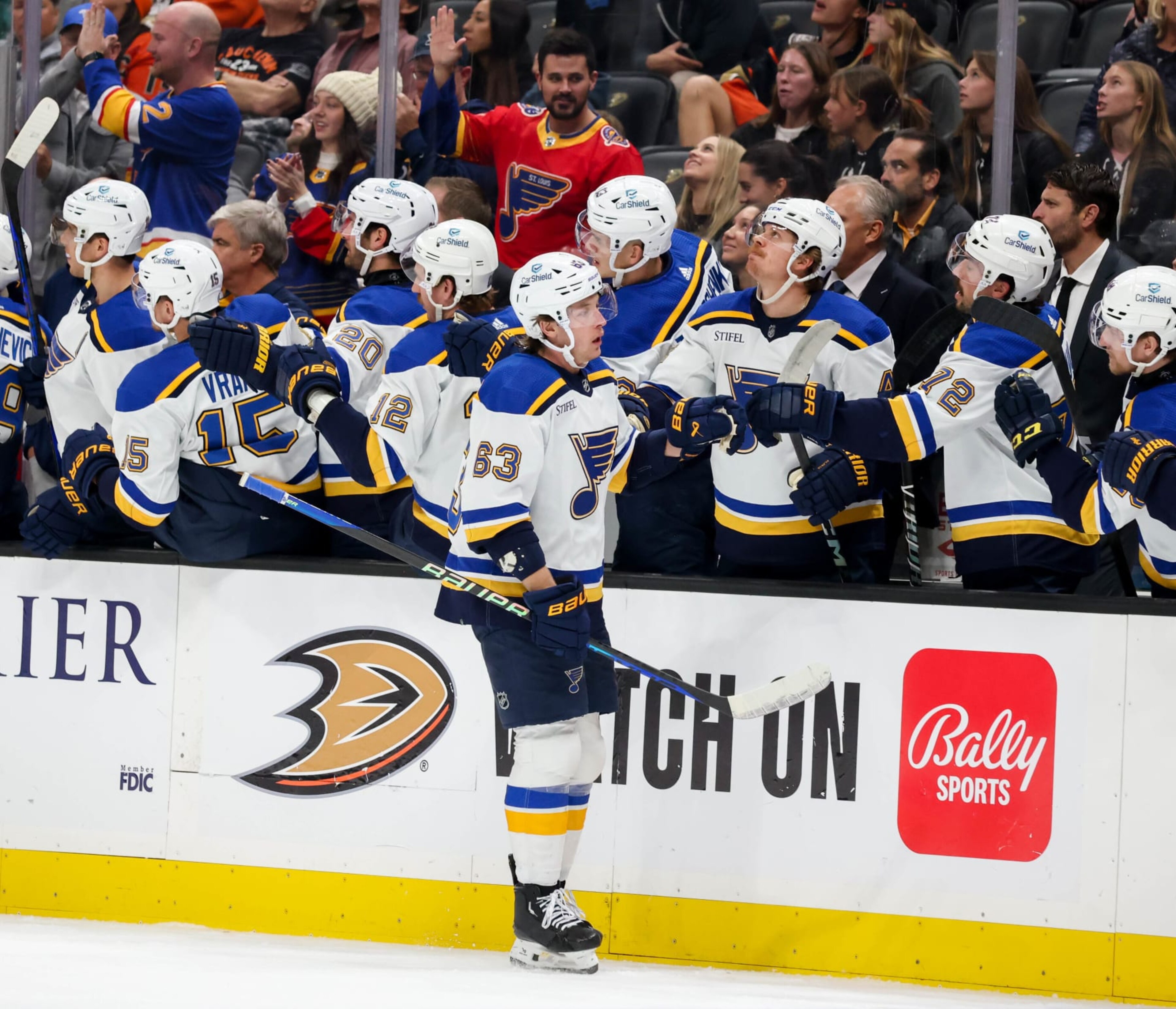 ANAHEIM, CA - NOVEMBER 19:  Jake Neighbours #63 of the St. Louis Blues celebrate his goal with teammates during the first period against the Anaheim Ducks at Honda Center on November 19, 2023 in Anaheim, California. (Photo by Debora Robinson/NHLI via Getty Images)