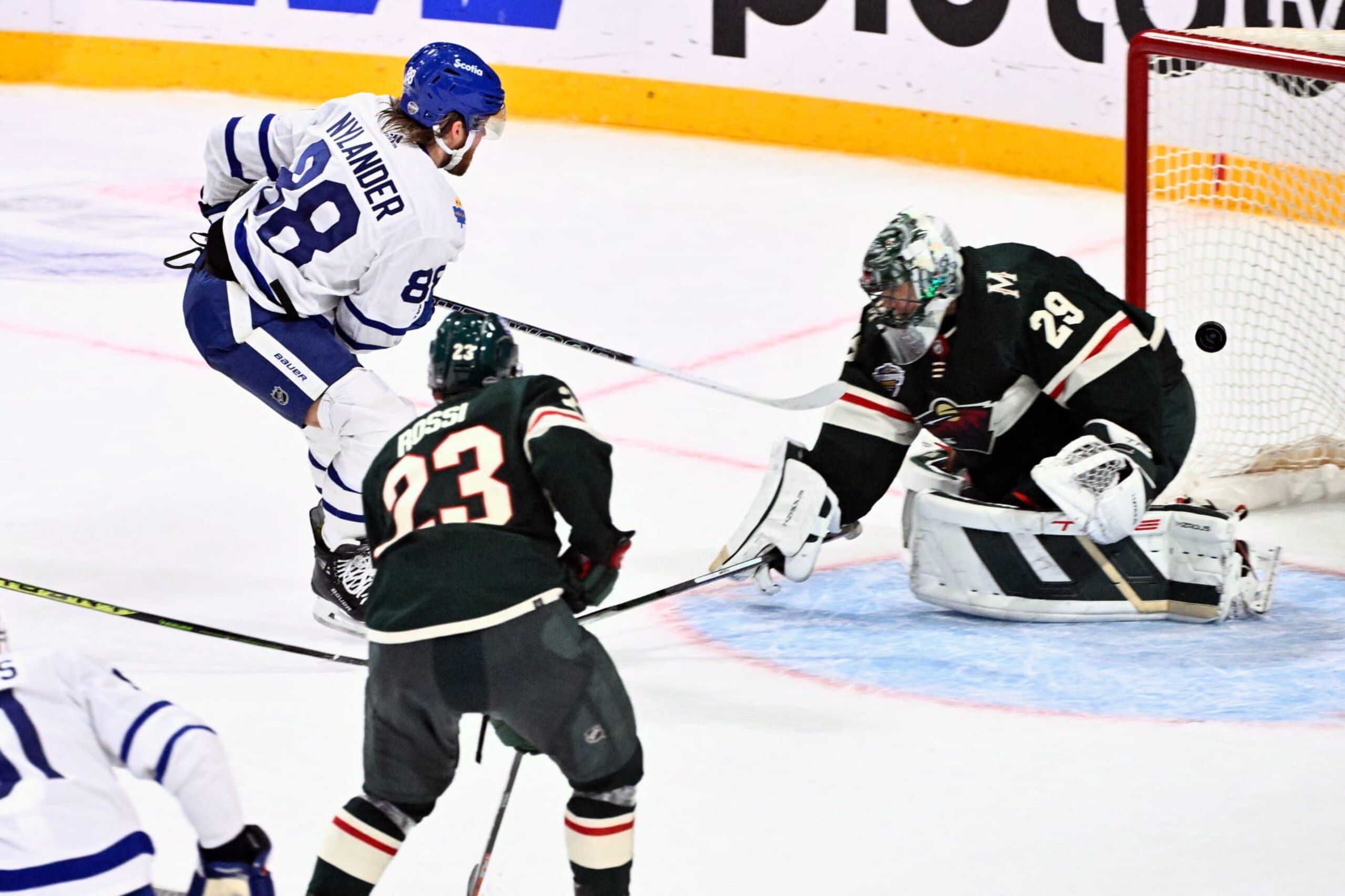 Toronto's William Nylander (L) scores past Minnesota's goalkeeper Marc-Andre Fleury during the NHL Global Series Sweden ice hockey match between Toronto Maple Leafs and Minnesota Wild at Avicii Arena in Stockholm, Sweden, on November 19, 2023. (Photo by Claudio BRESCIANI / TT NEWS AGENCY / AFP) / Sweden OUT (Photo by CLAUDIO BRESCIANI/TT NEWS AGENCY/AFP via Getty Images)