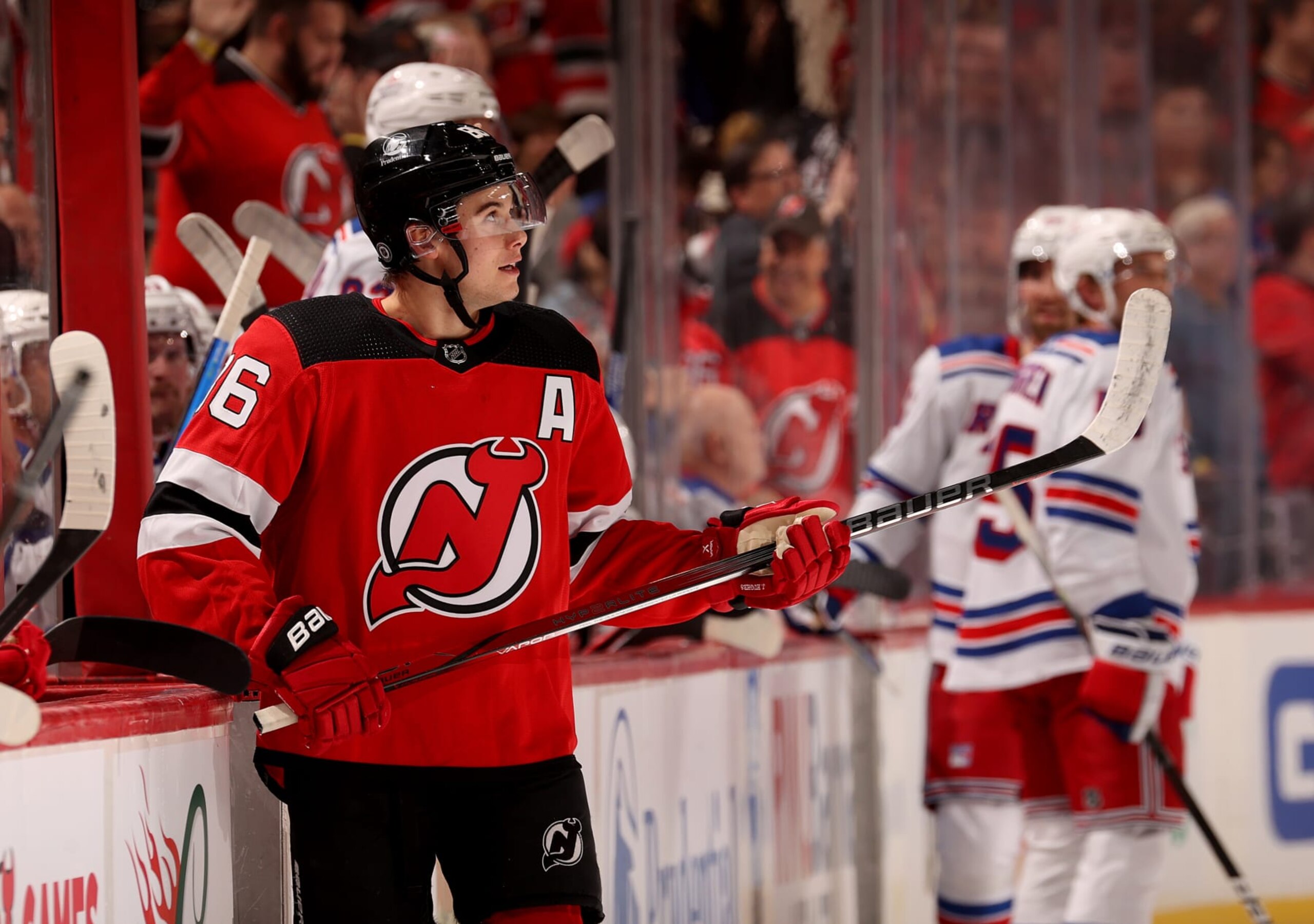 NEWARK, NEW JERSEY - NOVEMBER 18: Jack Hughes #86 of the New Jersey Devils waits for a review giving him a goal during the first period against the New York Rangers at Prudential Center on November 18, 2023 in Newark, New Jersey. (Photo by Elsa/Getty Images)