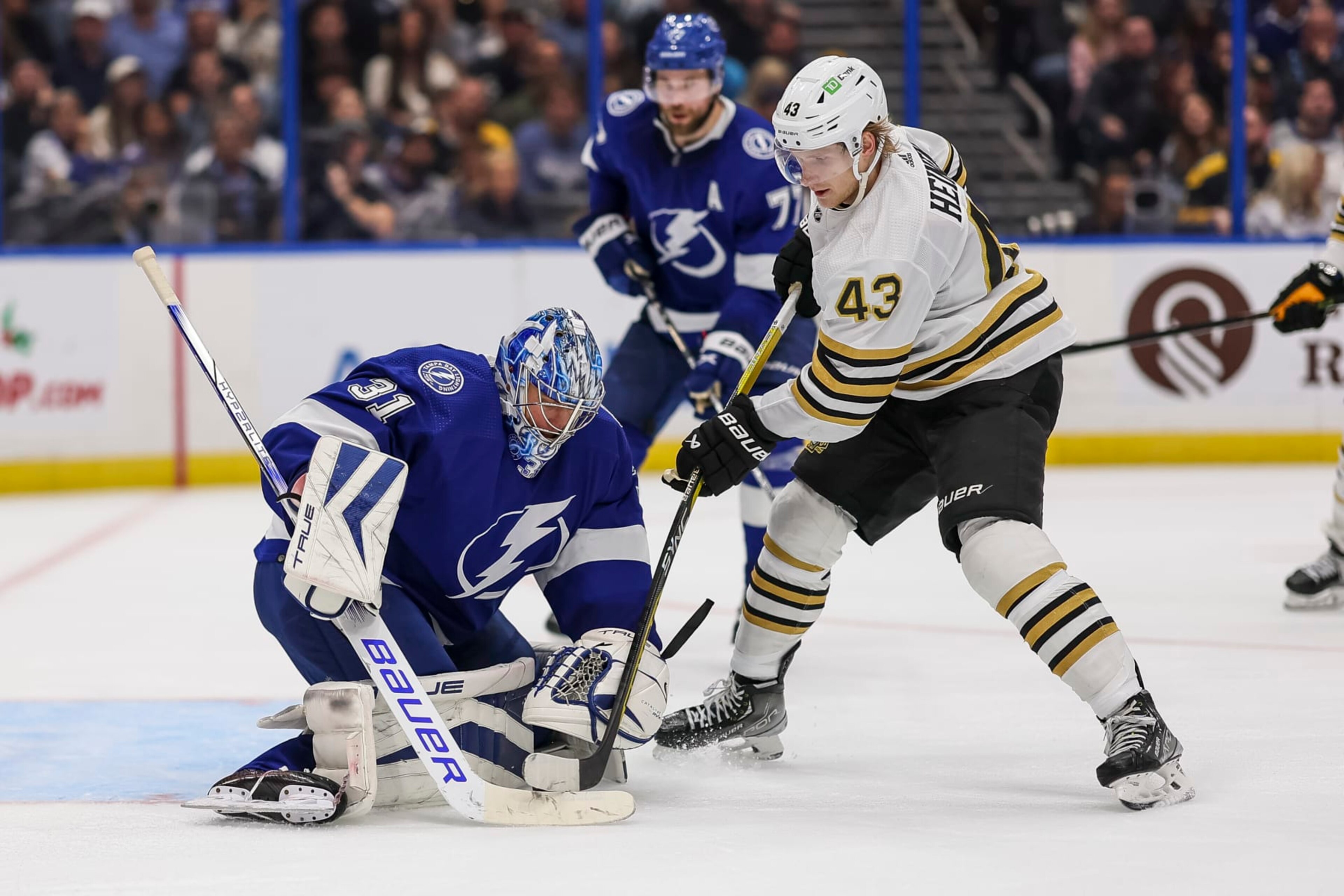 TAMPA, FL - NOVEMBER 20: Goalie Jonas Johansson #31 of the Tampa Bay Lightning against Danton Heinen #43 of the Boston Bruins during the second period at Amalie Arena on November 20, 2023 in Tampa, Florida. (Photo by Mike Carlson/NHLI via Getty Images)
