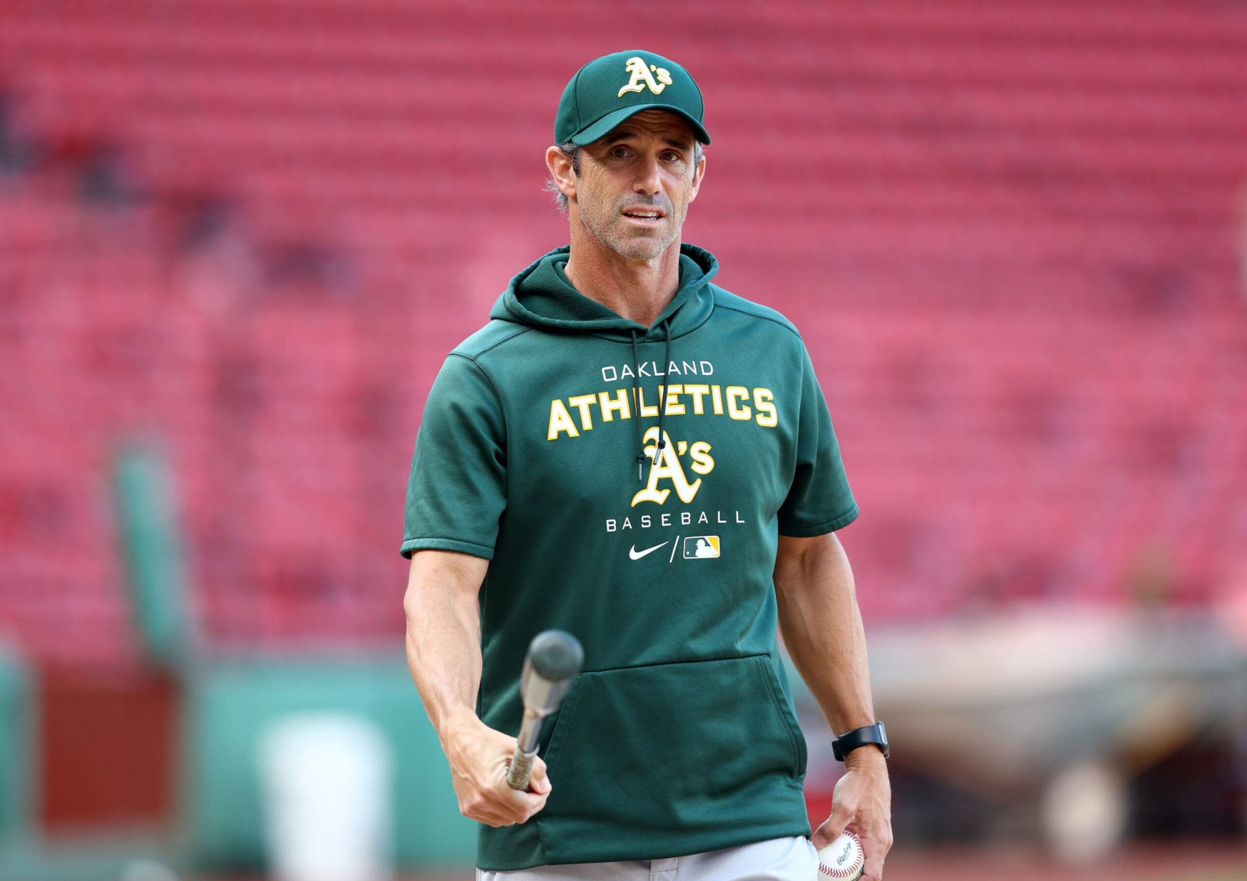 BOSTON, MASSACHUSETTS - JUNE 14:  Brad Ausmus #16 of the Oakland Athletics walks on the field during batting practice before the game against the Baltimore Orioles at Fenway Park on June 14, 2022 in Boston, Massachusetts. (Photo by Elsa/Getty Images)
