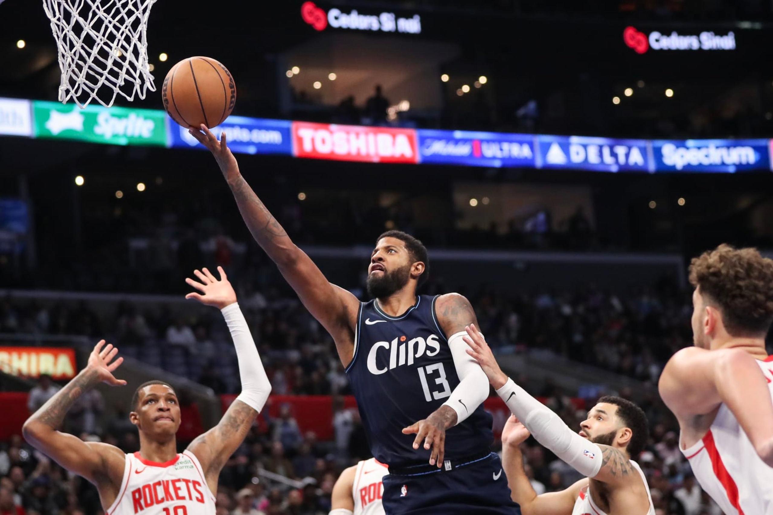 LOS ANGELES, CALIFORNIA - NOVEMBER 17: Paul George #13 of the LA Clippers drives to the basket in the fourth period against the Houston Rockets during an NBA In-Season Tournament game at Crypto.com Arena on November 17, 2023 in Los Angeles, California. NOTE TO USER: User expressly acknowledges and agrees that, by downloading and or using this photograph, User is consenting to the terms and conditions of the Getty Images License Agreement. (Photo by Meg Oliphant/Getty Images)