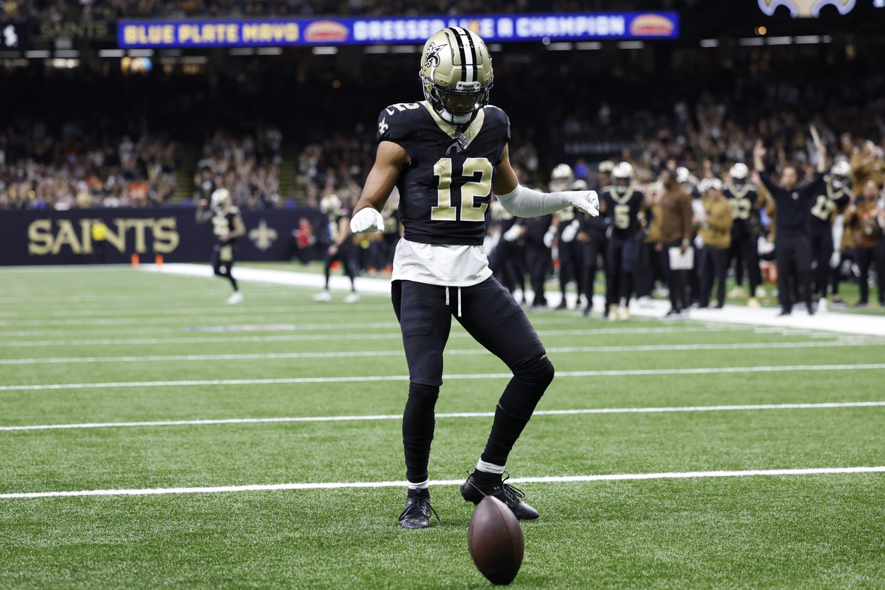 NEW ORLEANS, LOUISIANA - NOVEMBER 05: Chris Olave #12 of the New Orleans Saints celebrates after a touchdown during the first quarter in the game against the Chicago Bears at Caesars Superdome on November 05, 2023 in New Orleans, Louisiana. (Photo by Wesley Hitt/Getty Images)