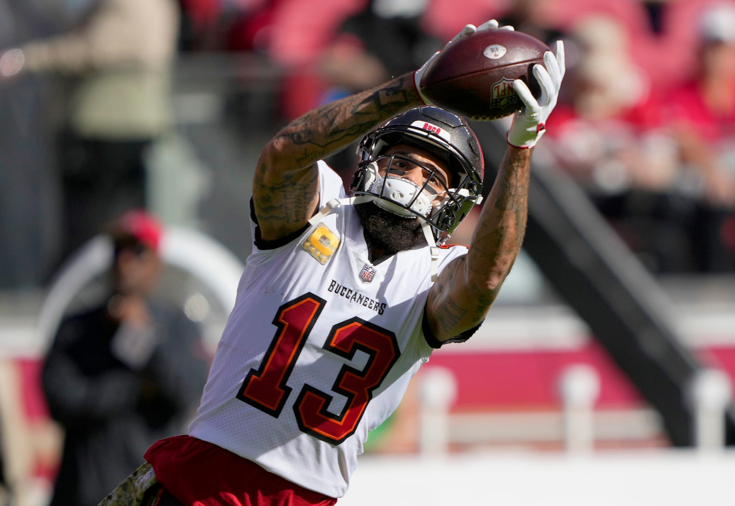 SANTA CLARA, CALIFORNIA - NOVEMBER 19: Mike Evans #13 of the Tampa Bay Buccaneers warms up prior to the game against the San Francisco 49ers at Levi's Stadium on November 19, 2023 in Santa Clara, California. (Photo by Thearon W. Henderson/Getty Images)