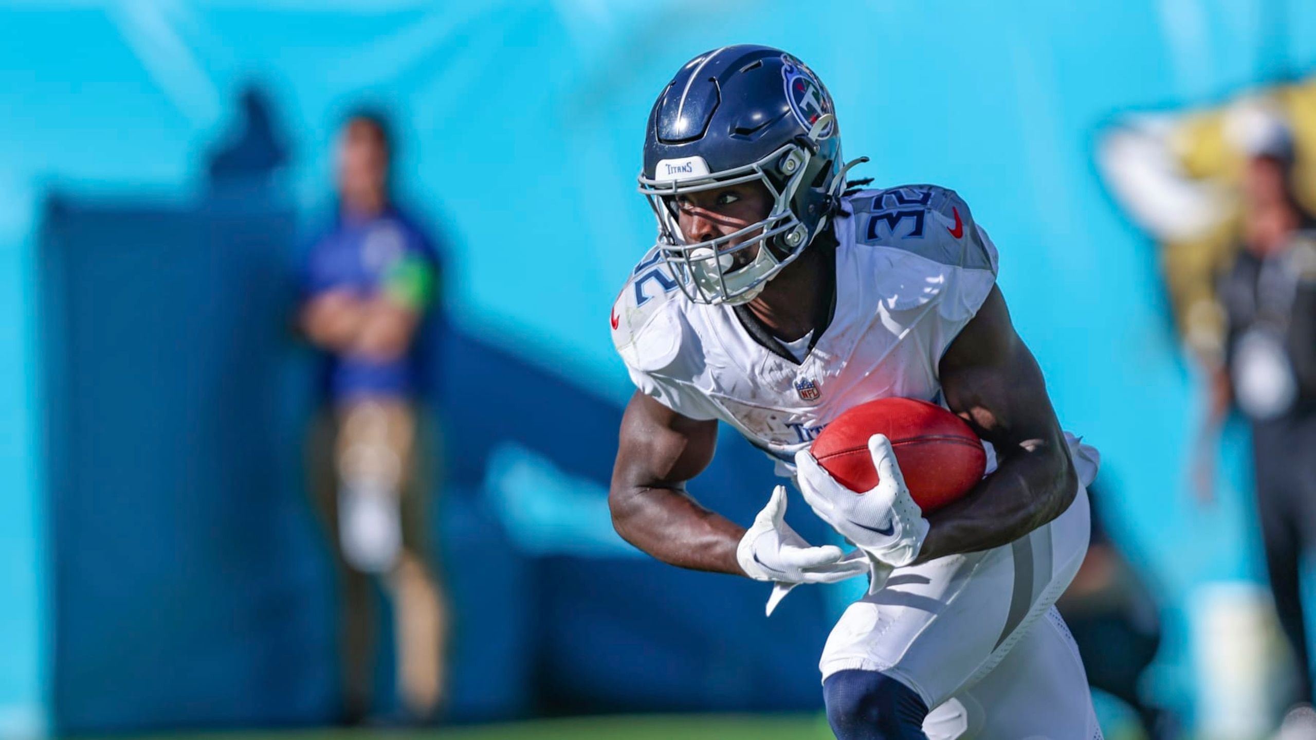 Tennessee Titans running back Tyjae Spears (32) returns a kickoff during an NFL football game against the Jacksonville Jaguars, Sunday, Nov. 19, 2023, in Jacksonville, Fla. The Jaguars defeated the Titans 34-14. (AP Photo/Gary McCullough)