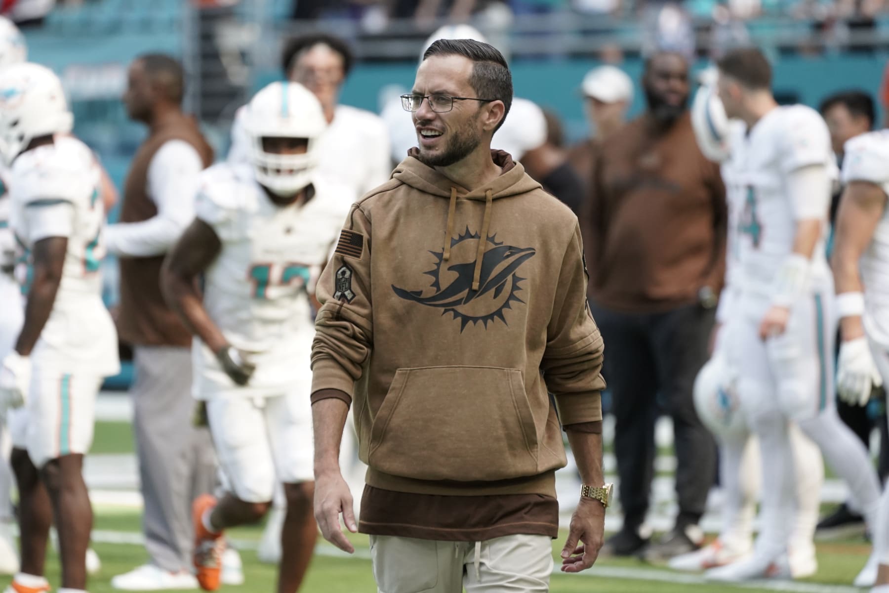 MIAMI GARDENS, FLORIDA - NOVEMBER 19: Head coach Mike McDaniel of the Miami Dolphins walks on the field during warm ups  prior to the game against the Las Vegas Raiders at Hard Rock Stadium on November 19, 2023 in Miami Gardens, Florida. (Photo by Bryan Cereijo/Getty Images)