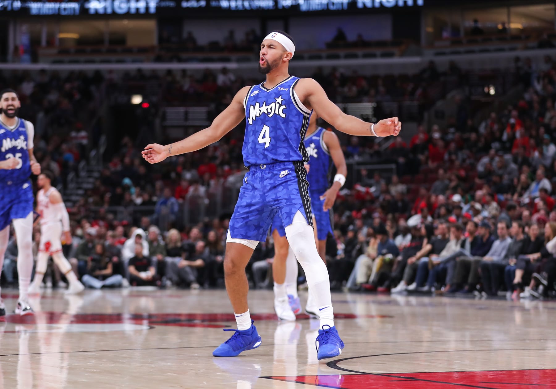 CHICAGO, IL - NOVEMBER 15: Jalen Suggs (4) of the Orlando Magic reacts after a play against the Chicago Bulls during the second half at the United Center on November 15, 2023 in Chicago, Illinois. (Photo by Melissa Tamez/Icon Sportswire via Getty Images)