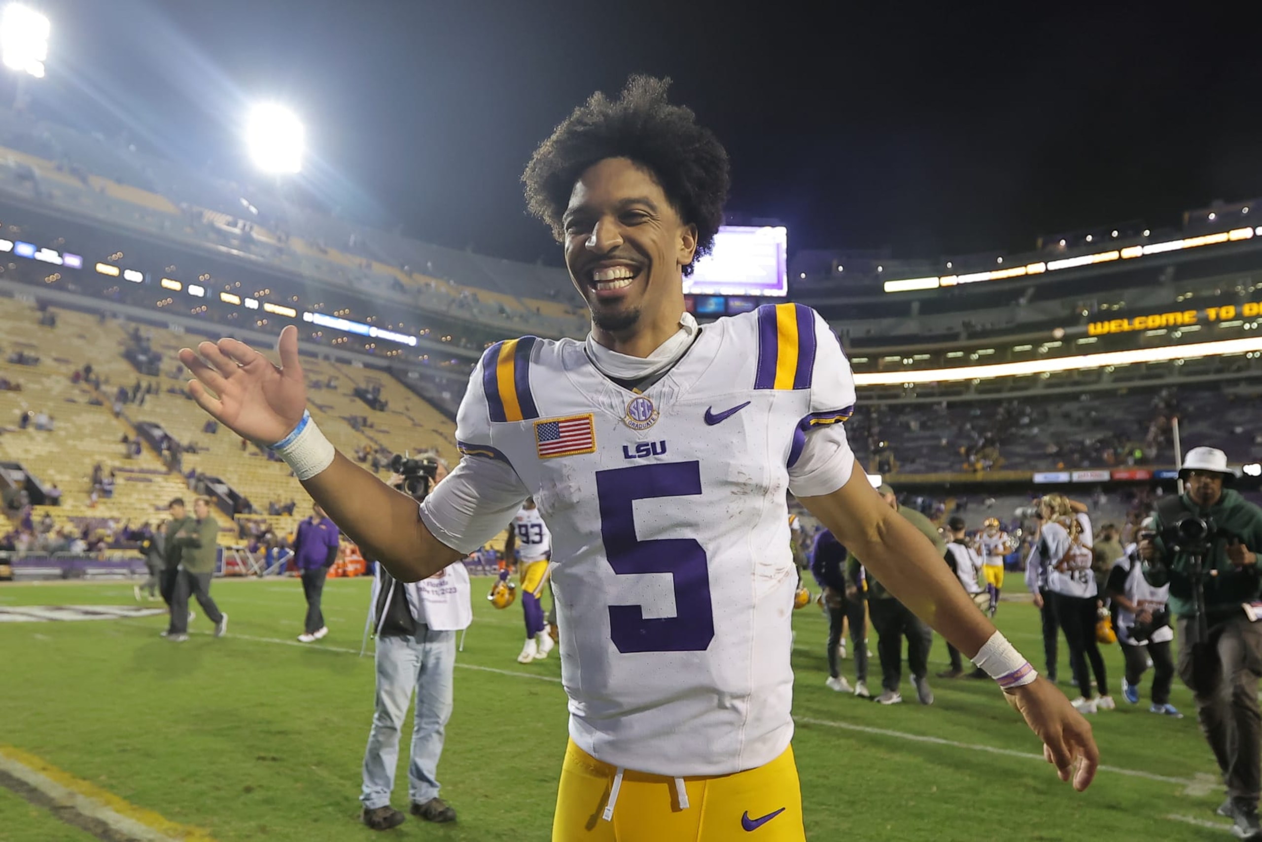 BATON ROUGE, LOUISIANA - NOVEMBER 11: Jayden Daniels #5 of the LSU Tigers celebrates a win over the Florida Gators after a game at Tiger Stadium on November 11, 2023 in Baton Rouge, Louisiana. (Photo by Jonathan Bachman/Getty Images)