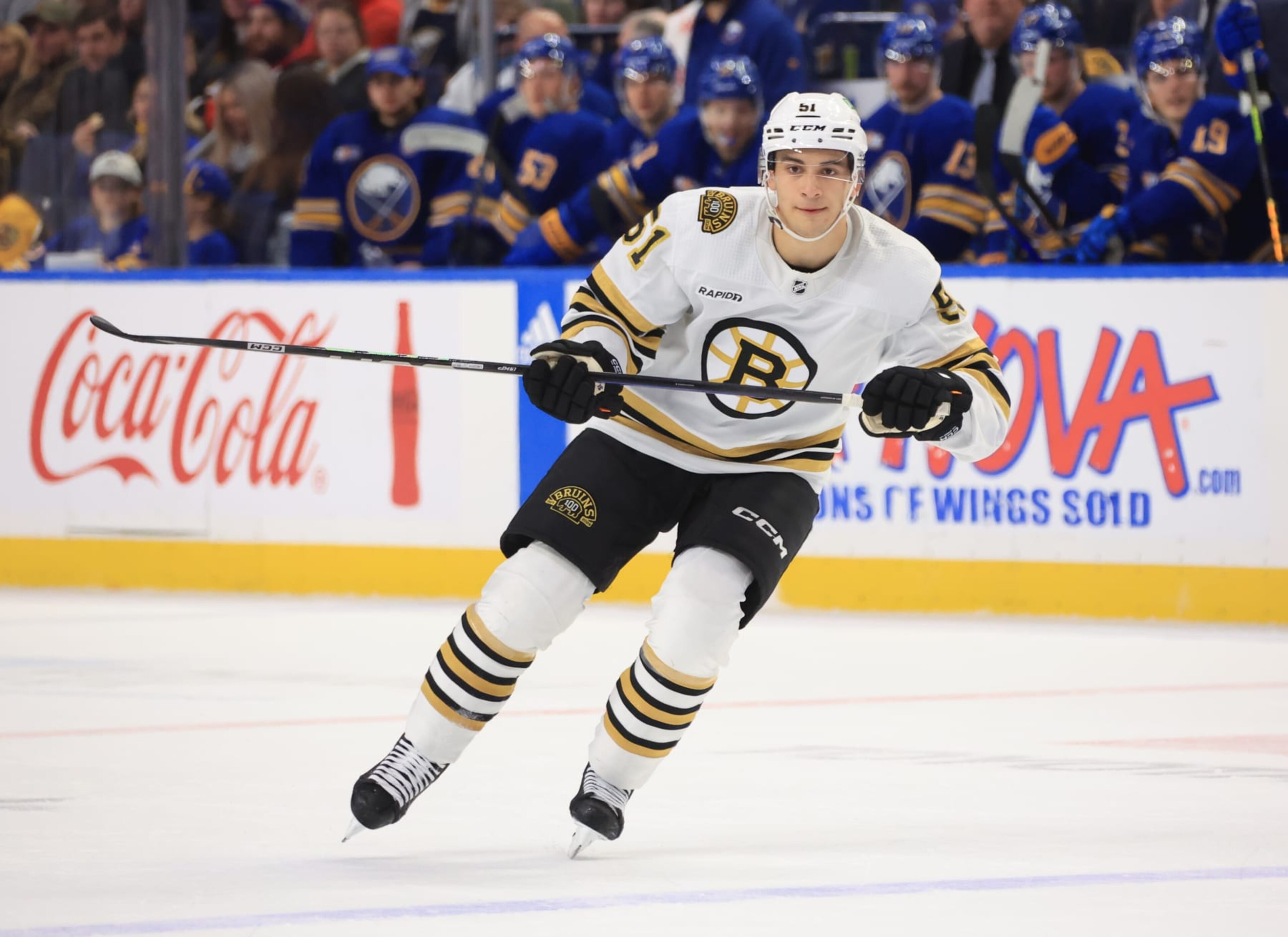 BUFFALO, NEW YORK - NOVEMBER 14: Matthew Poitras #51 of the Boston Bruins skates against the Buffalo Sabres during an NHL game on November 14, 2023 at KeyBank Center in Buffalo, New York. (Photo by Bill Wippert/NHLI via Getty Images) BUFFALO, NEW YORK - NOVEMBER 14: Matthew Poitras #51 of the Boston Bruins skates against the Buffalo Sabres during an NHL game on November 14, 2023 at KeyBank Center in Buffalo, New York. (Photo by Bill Wippert/NHLI via Getty Images)