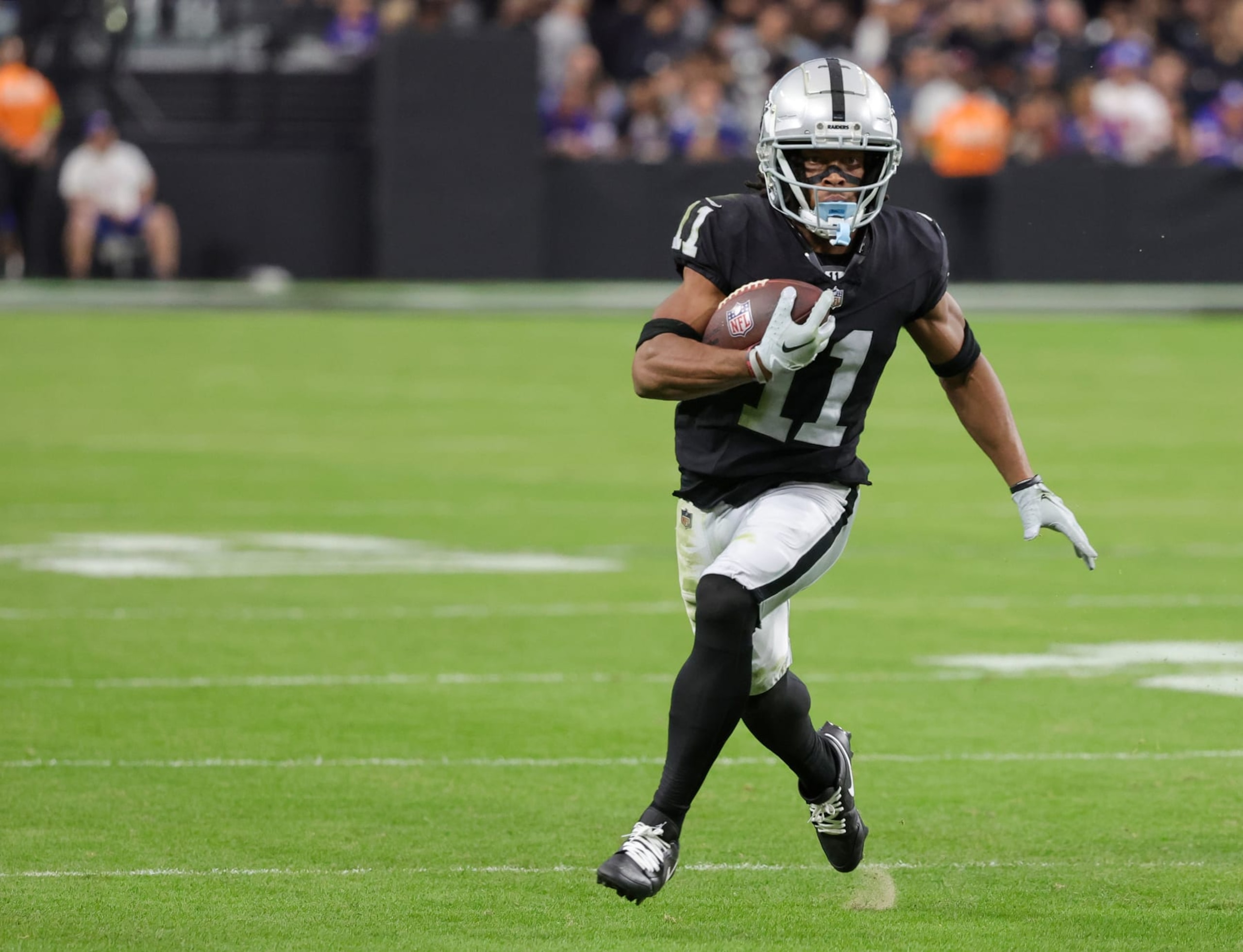 LAS VEGAS, NEVADA - NOVEMBER 05: Wide receiver Tre Tucker #11 of the Las Vegas Raiders runs against the New York Giants in the third quarter of their game at Allegiant Stadium on November 05, 2023 in Las Vegas, Nevada. The Raiders defeated the Giants 30-6. (Photo by Ethan Miller/Getty Images) LAS VEGAS, NEVADA - NOVEMBER 05: Wide receiver Tre Tucker #11 of the Las Vegas Raiders runs against the New York Giants in the third quarter of their game at Allegiant Stadium on November 05, 2023 in Las Vegas, Nevada. The Raiders defeated the Giants 30-6. (Photo by Ethan Miller/Getty Images)