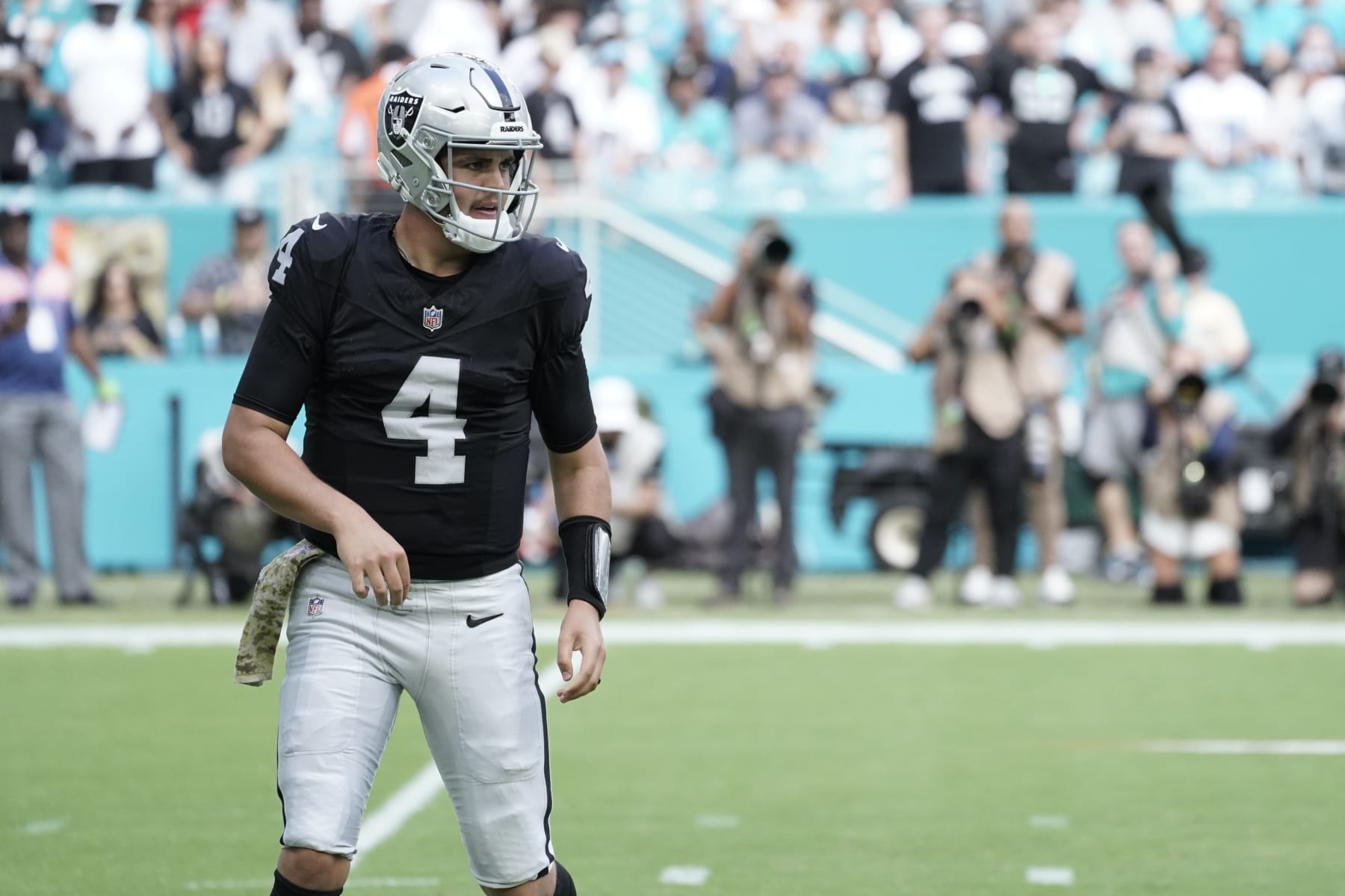 MIAMI GARDENS, FLORIDA - NOVEMBER 19: Aidan O'Connell #4 of the Las Vegas Raiders looks on in the game against the Miami Dolphins during the first quarter at Hard Rock Stadium on November 19, 2023 in Miami Gardens, Florida. (Photo by Bryan Cereijo/Getty Images)