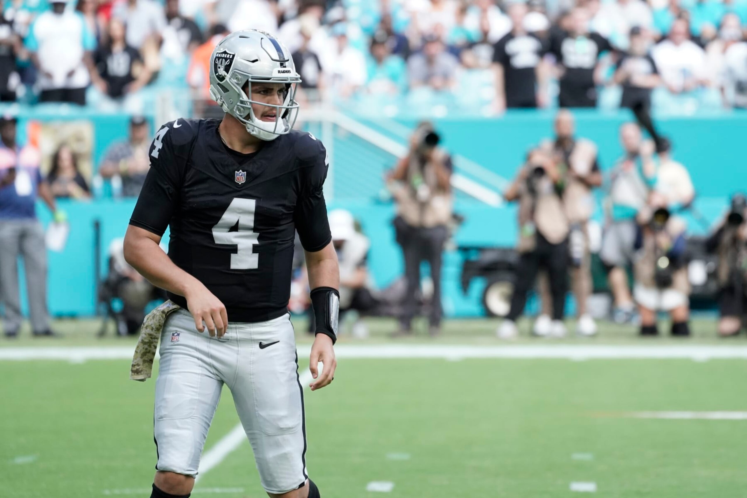 MIAMI GARDENS, FLORIDA - NOVEMBER 19: Aidan O'Connell #4 of the Las Vegas Raiders looks on in the game against the Miami Dolphins during the first quarter at Hard Rock Stadium on November 19, 2023 in Miami Gardens, Florida. (Photo by Bryan Cereijo/Getty Images) MIAMI GARDENS, FLORIDA - NOVEMBER 19: Aidan O'Connell #4 of the Las Vegas Raiders looks on in the game against the Miami Dolphins during the first quarter at Hard Rock Stadium on November 19, 2023 in Miami Gardens, Florida. (Photo by Bryan Cereijo/Getty Images)