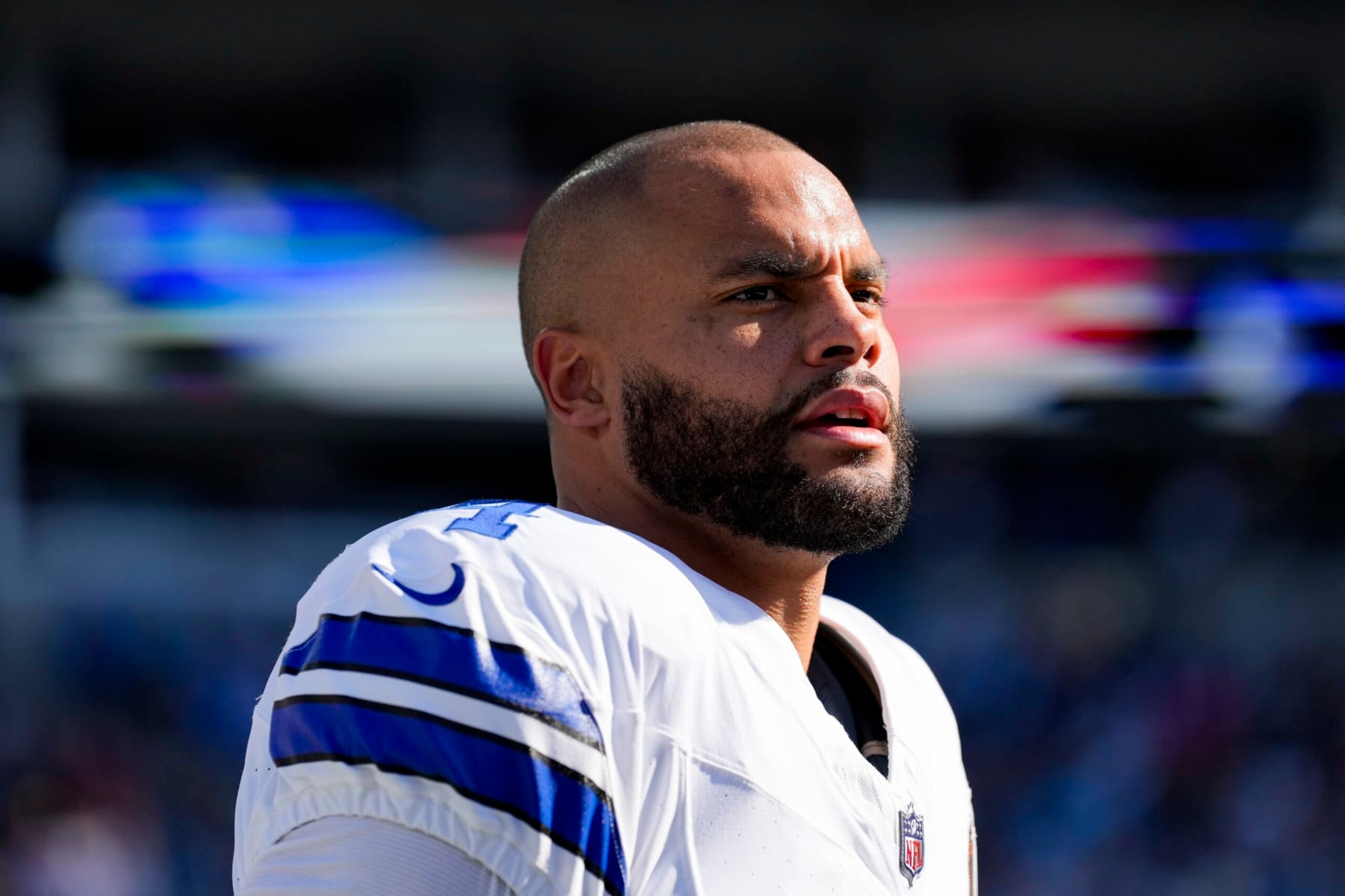 CHARLOTTE, NORTH CAROLINA - NOVEMBER 19: Dak Prescott #4 of the Dallas Cowboys looks on prior to an NFL football game against the Carolina Panthers at Bank of America Stadium on November 19, 2023 in Charlotte, North Carolina. (Kara Durrette/Getty Images) CHARLOTTE, NORTH CAROLINA - NOVEMBER 19: Dak Prescott #4 of the Dallas Cowboys looks on prior to an NFL football game against the Carolina Panthers at Bank of America Stadium on November 19, 2023 in Charlotte, North Carolina. (Kara Durrette/Getty Images)