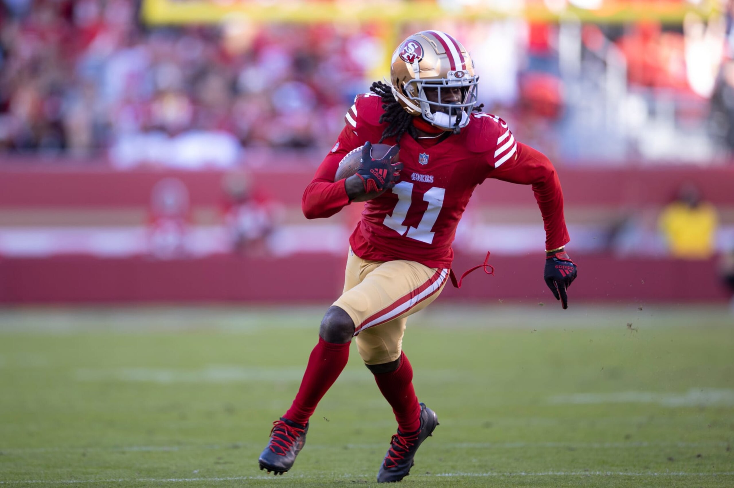 SANTA CLARA, CA - NOVEMBER 19: Brandon Aiyuk #11 of the San Francisco 49ers runs after making a catch during the game against the Tampa Bay Buccaneers at Levi's Stadium on November 19, 2023 in Santa Clara, California. The 49ers defeated the Buccaneers 27-14. (Photo by Michael Zagaris/San Francisco 49ers/Getty Images)