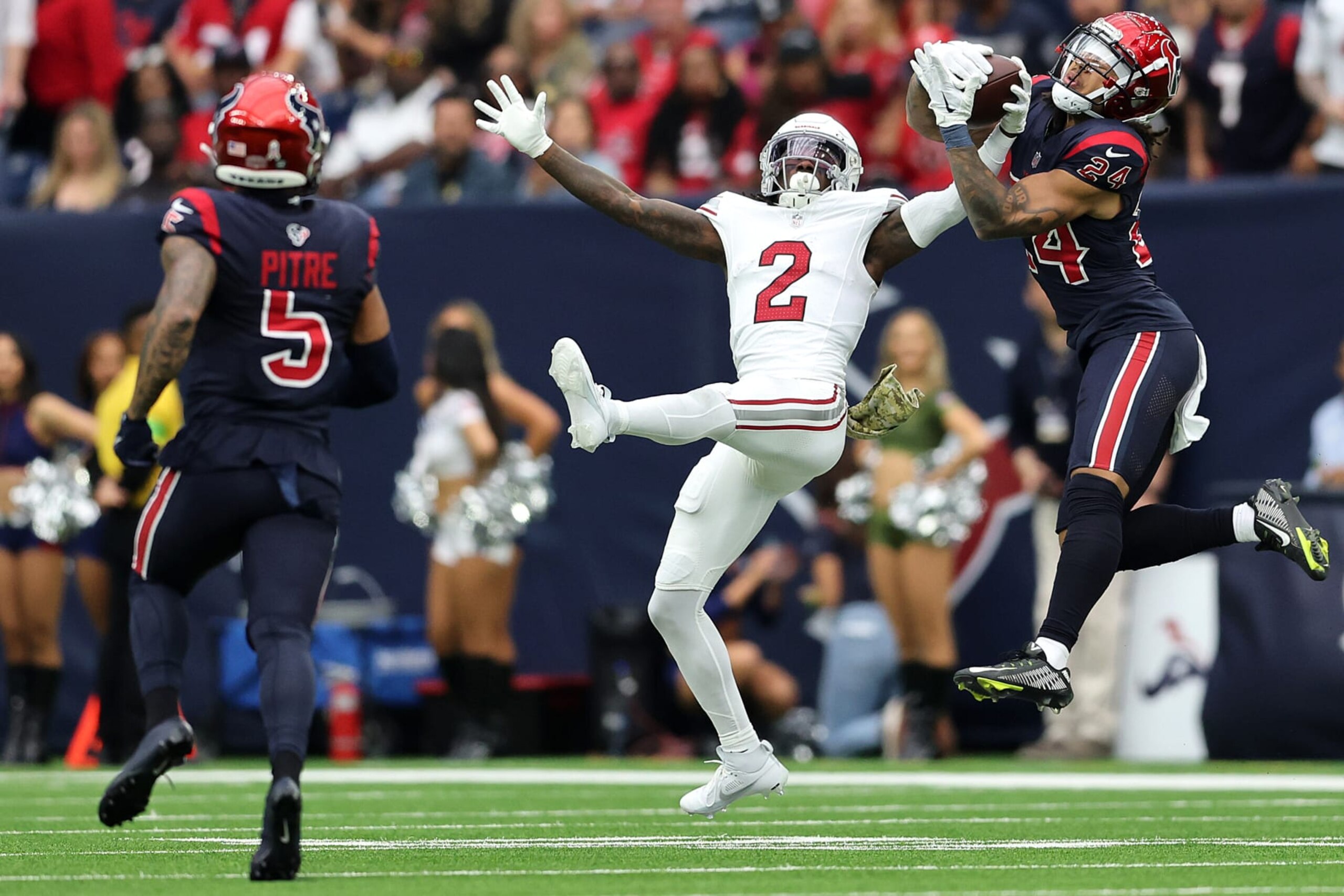 HOUSTON, TEXAS - NOVEMBER 19: Derek Stingley Jr. #24 of the Houston Texans intercepts a pass intended for Marquise Brown #2 of the Arizona Cardinals during the second quarter at NRG Stadium on November 19, 2023 in Houston, Texas. (Photo by Tim Warner/Getty Images) HOUSTON, TEXAS - NOVEMBER 19: Derek Stingley Jr. #24 of the Houston Texans intercepts a pass intended for Marquise Brown #2 of the Arizona Cardinals during the second quarter at NRG Stadium on November 19, 2023 in Houston, Texas. (Photo by Tim Warner/Getty Images)