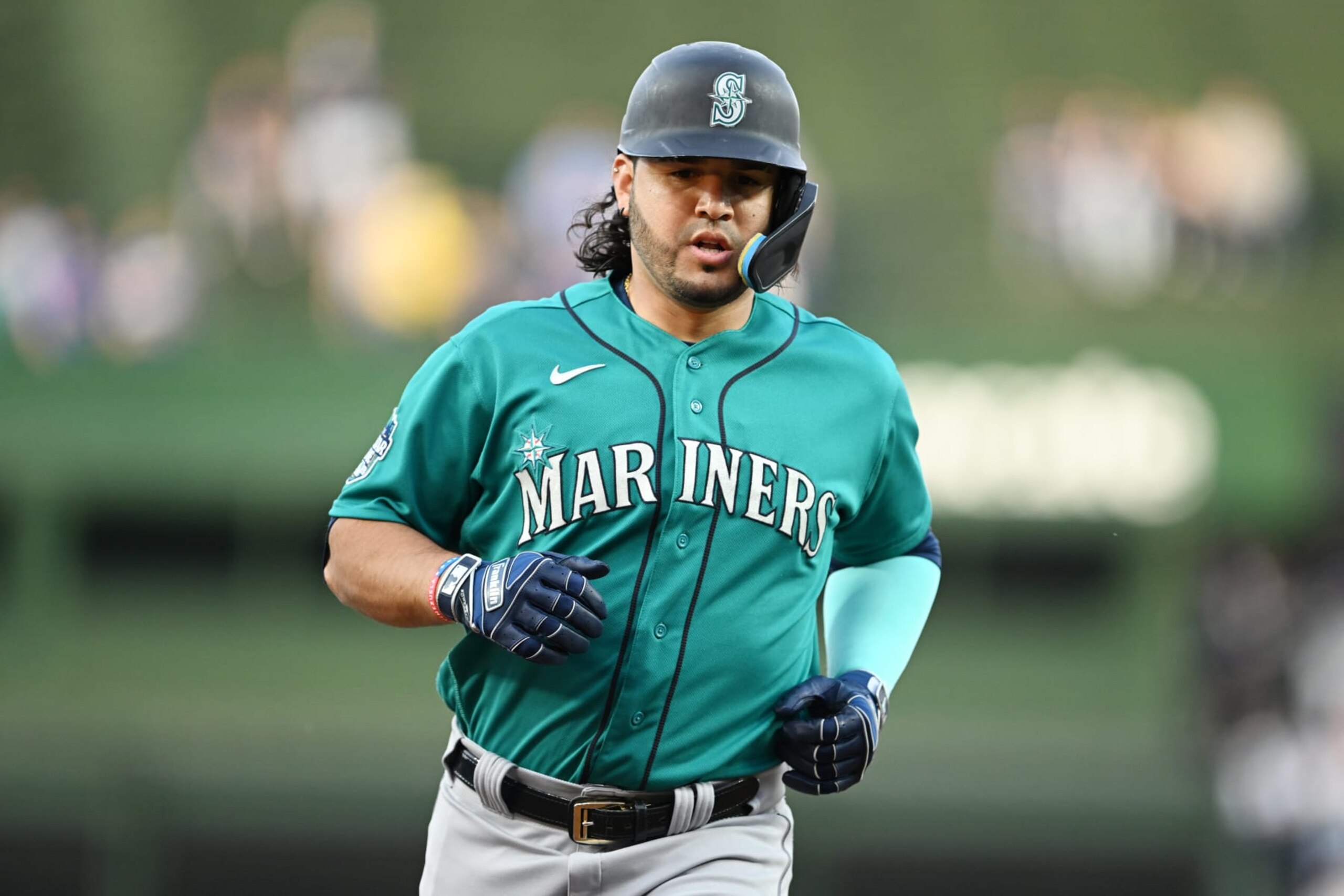 CHICAGO, ILLINOIS - APRIL 11: Eugenio Suarez #28 of the Seattle Mariners hits a home run against the Chicago Cubs at Wrigley Field on April 11, 2023 in Chicago, Illinois. (Photo by Quinn Harris/Getty Images) CHICAGO, ILLINOIS - APRIL 11: Eugenio Suarez #28 of the Seattle Mariners hits a home run against the Chicago Cubs at Wrigley Field on April 11, 2023 in Chicago, Illinois. (Photo by Quinn Harris/Getty Images)