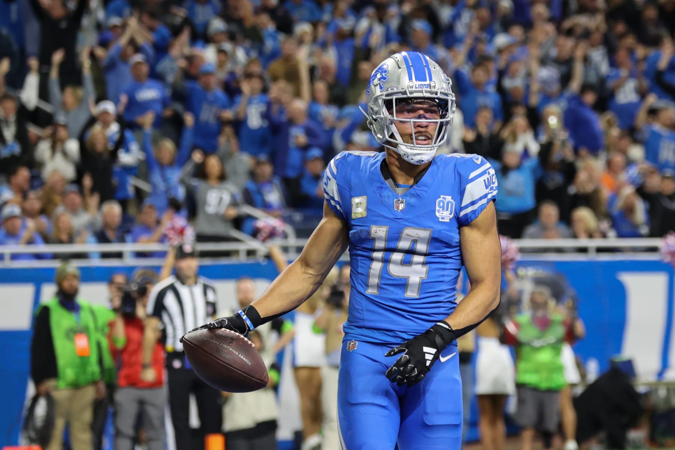 DETROIT, MI - NOVEMBER 19:  Detroit Lions wide receiver Amon-Ra St. Brown (14) looks on after catching a pass in the end zone for a touchdown during an NFL football game between the Chicago Bears and the Detroit Lions on November 19, 2023 at Ford Field in Detroit, Michigan.  (Photo by Scott W. Grau/Icon Sportswire via Getty Images)