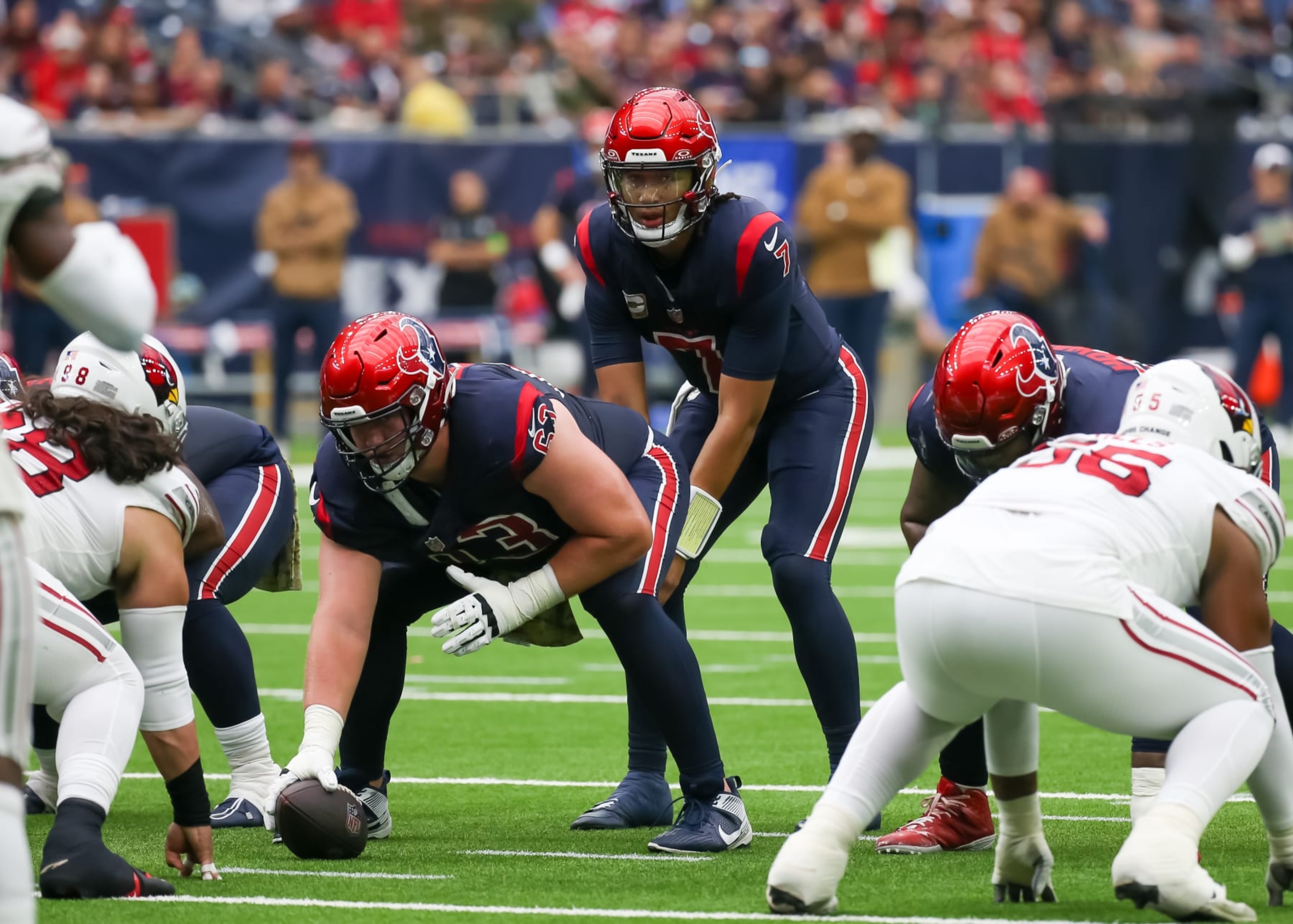 HOUSTON, TX - NOVEMBER 19: Houston Texans center Michael Deiter (63) snaps the ball to Houston Texans quarterback C.J. Stroud (7) in the second quarter during the NFL game between the Arizona Cardinals and Houston Texans on November 19, 2023 at NRG Stadium in Houston, Texas. (Photo by Leslie Plaza Johnson/Icon Sportswire via Getty Images) HOUSTON, TX - NOVEMBER 19: Houston Texans center Michael Deiter (63) snaps the ball to Houston Texans quarterback C.J. Stroud (7) in the second quarter during the NFL game between the Arizona Cardinals and Houston Texans on November 19, 2023 at NRG Stadium in Houston, Texas. (Photo by Leslie Plaza Johnson/Icon Sportswire via Getty Images)