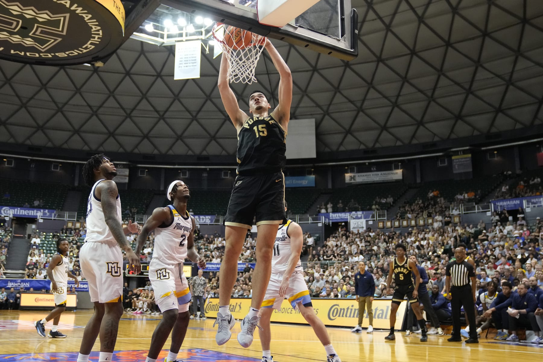 HONOLULU, HI - NOVEMBER 22:  Zach Edey #15 of the Purdue Boilermakers dunks the ball in the first half of a college basketball game against the Marquette Golden Eagles during the championship game of the Allstate Maui Invitational at the SimpliFi Arena at Stan Sheriff Center on November 22, 2023 in Honolulu, Hawaii.  (Photo by Mitchell Layton/Getty Images)