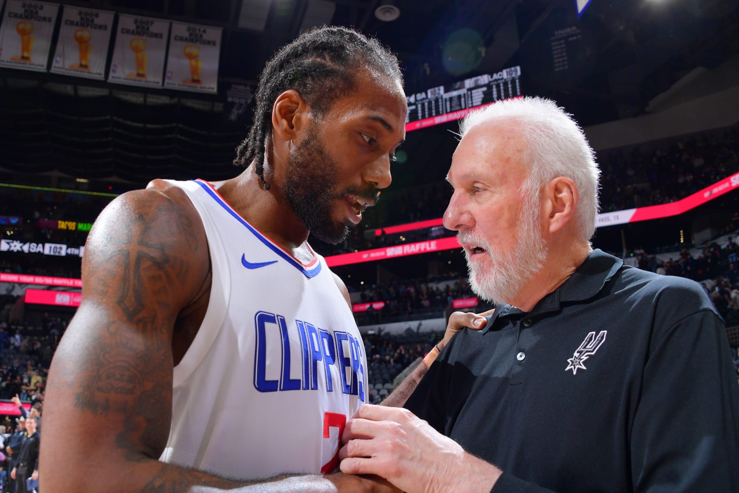 SAN ANTONIO, TX - NOVEMBER 22: Kawhi Leonard #2 of the LA Clippers talks to Head Coach Gregg Popovich of the San Antonio Spurs after the game on November 22, 2023 at the Frost Bank Center in San Antonio, Texas. NOTE TO USER: User expressly acknowledges and agrees that, by downloading and or using this photograph, user is consenting to the terms and conditions of the Getty Images License Agreement. Mandatory Copyright Notice: Copyright 2023 NBAE (Photos by Michael Gonzales/NBAE via Getty Images) SAN ANTONIO, TX - NOVEMBER 22: Kawhi Leonard #2 of the LA Clippers talks to Head Coach Gregg Popovich of the San Antonio Spurs after the game on November 22, 2023 at the Frost Bank Center in San Antonio, Texas. NOTE TO USER: User expressly acknowledges and agrees that, by downloading and or using this photograph, user is consenting to the terms and conditions of the Getty Images License Agreement. Mandatory Copyright Notice: Copyright 2023 NBAE (Photos by Michael Gonzales/NBAE via Getty Images)
