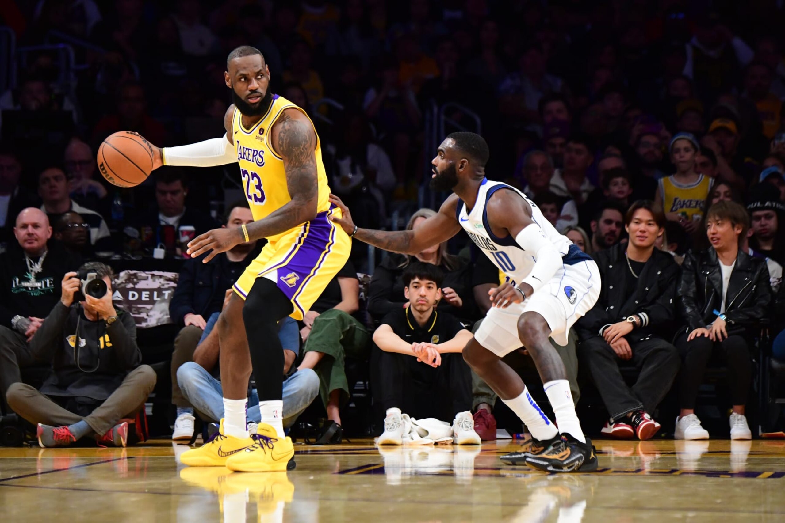 LOS ANGELES, CA - NOVEMBER 22: LeBron James #23 of the Los Angeles Lakers handles the ball while Tim Hardaway Jr. #10 of the Dallas Mavericks plays defense during the game on November 22, 2023 at Crypto.Com Arena in Los Angeles, California. NOTE TO USER: User expressly acknowledges and agrees that, by downloading and/or using this Photograph, user is consenting to the terms and conditions of the Getty Images License Agreement. Mandatory Copyright Notice: Copyright 2023 NBAE (Photo by Adam Pantozzi/NBAE via Getty Images)
