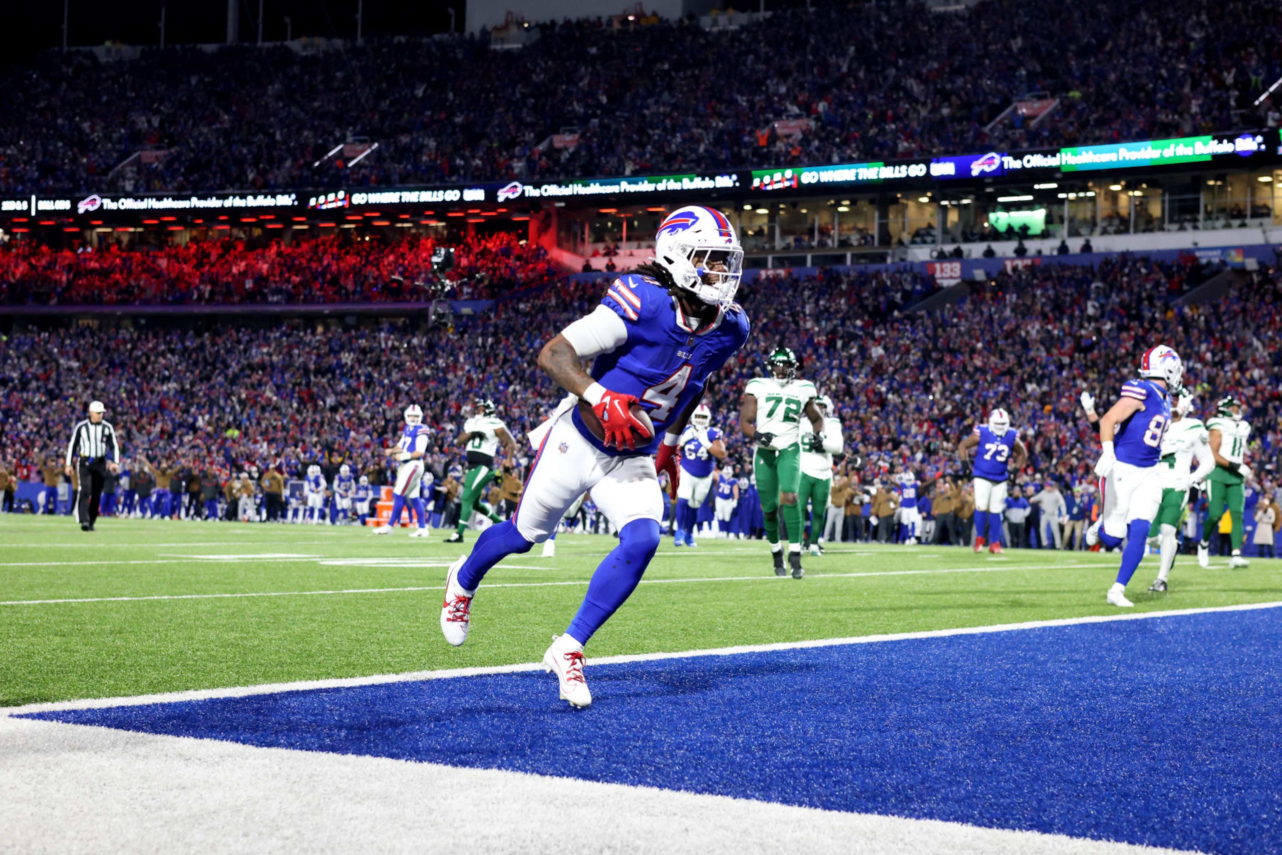 ORCHARD PARK, NEW YORK - NOVEMBER 19: James Cook #4 of the Buffalo Bills scores a touchdown during the second quarter against the New York Jets at Highmark Stadium on November 19, 2023 in Orchard Park, New York. (Photo by Bryan Bennett/Getty Images)