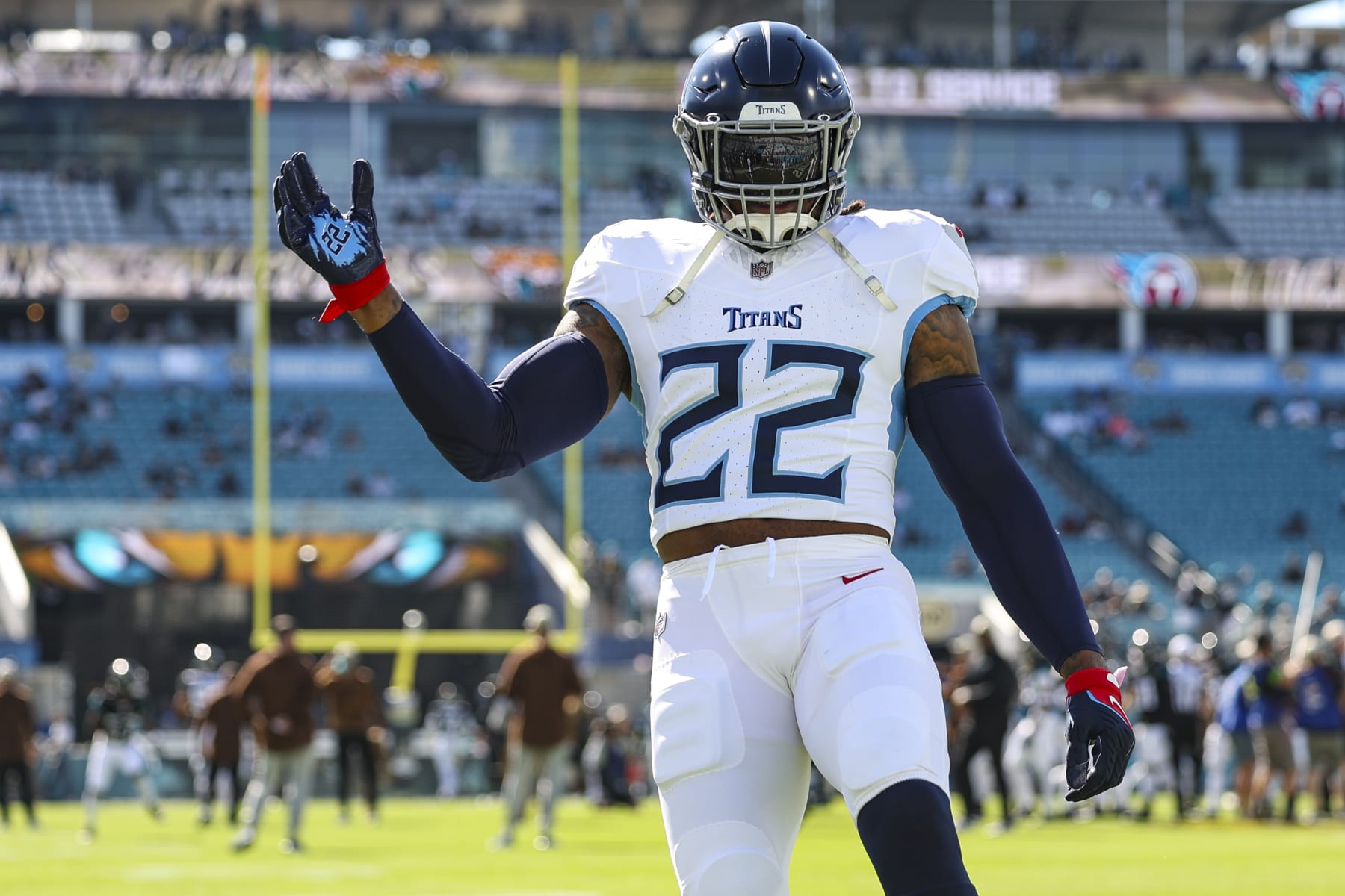 JACKSONVILLE, FL - NOVEMBER 19: Derrick Henry #22 of the Tennessee Titans warms up prior to an NFL football game against the Jacksonville Jaguars at EverBank Stadium on November 19, 2023 in Jacksonville, Florida. (Photo by Perry Knotts/Getty Images)