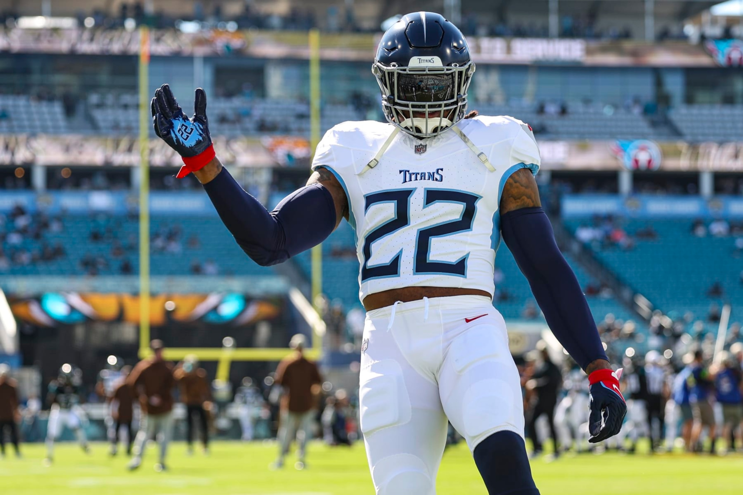 JACKSONVILLE, FL - NOVEMBER 19: Derrick Henry #22 of the Tennessee Titans warms up prior to an NFL football game against the Jacksonville Jaguars at EverBank Stadium on November 19, 2023 in Jacksonville, Florida. (Photo by Perry Knotts/Getty Images)