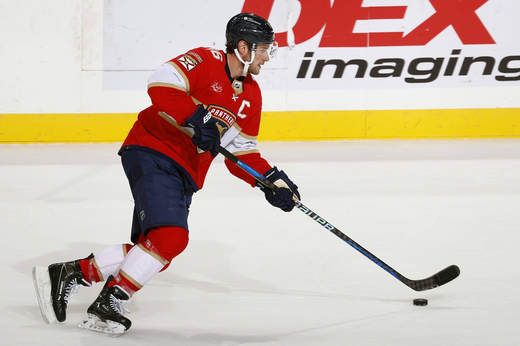 SUNRISE, FLORIDA - NOVEMBER 12: Aleksander Barkov #16 of the Florida Panthers skates with the puck against the Chicago Blackhawks at the Amerant Bank Arena on November 12, 2023 in Sunrise, Florida. (Photo by Eliot J. Schechter/NHLI via Getty Images)