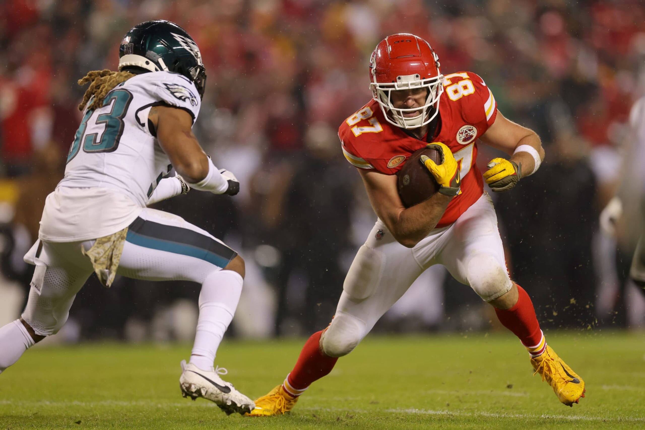 KANSAS CITY, MISSOURI - NOVEMBER 20: Travis Kelce #87 of the Kansas City Chiefs is tackled by Bradley Roby #33 of the Philadelphia Eagles in the second half at GEHA Field at Arrowhead Stadium on November 20, 2023 in Kansas City, Missouri. (Photo by Jamie Squire/Getty Images)