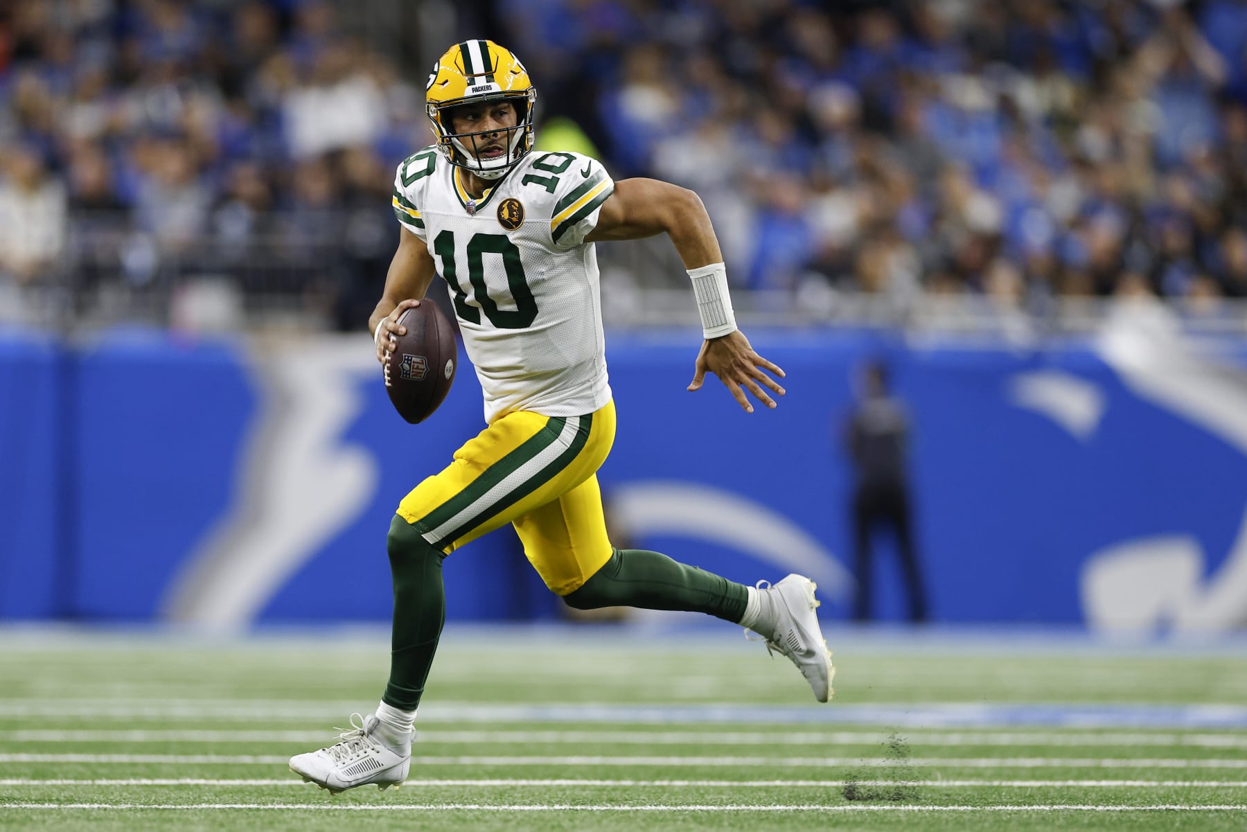 DETROIT, MICHIGAN - NOVEMBER 23: Jordan Love #10 of the Green Bay Packers looks to pass against the Detroit Lions during the first quarter of the game at Ford Field on November 23, 2023 in Detroit, Michigan. (Photo by Mike Mulholland/Getty Images)