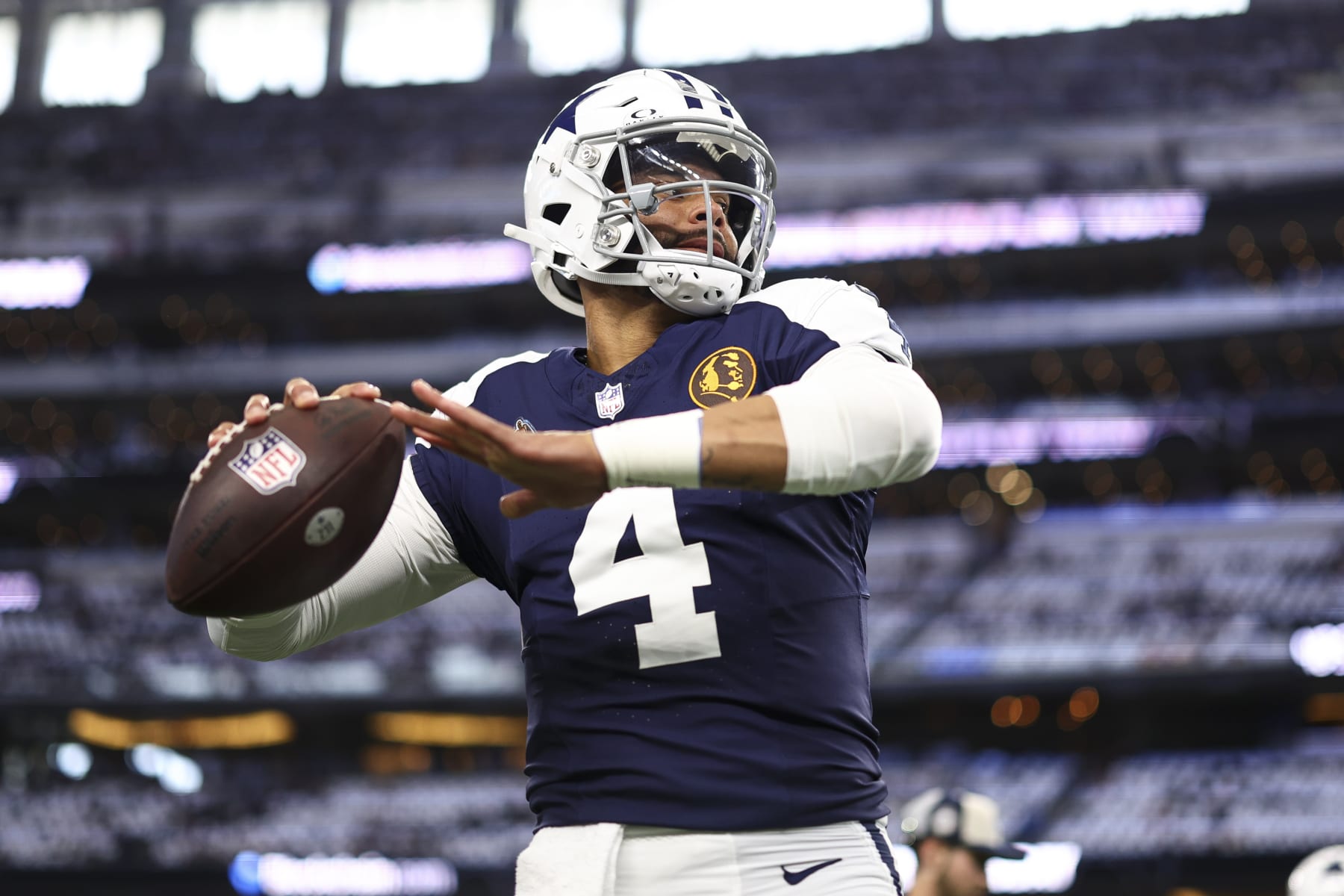 ARLINGTON, TX - NOVEMBER 23: Dak Prescott #4 of the Dallas Cowboys warms up prior to an NFL football game against the Washington Commanders at AT&T Stadium on November 23, 2023 in Arlington, Texas. (Photo by Kevin Sabitus/Getty Images)