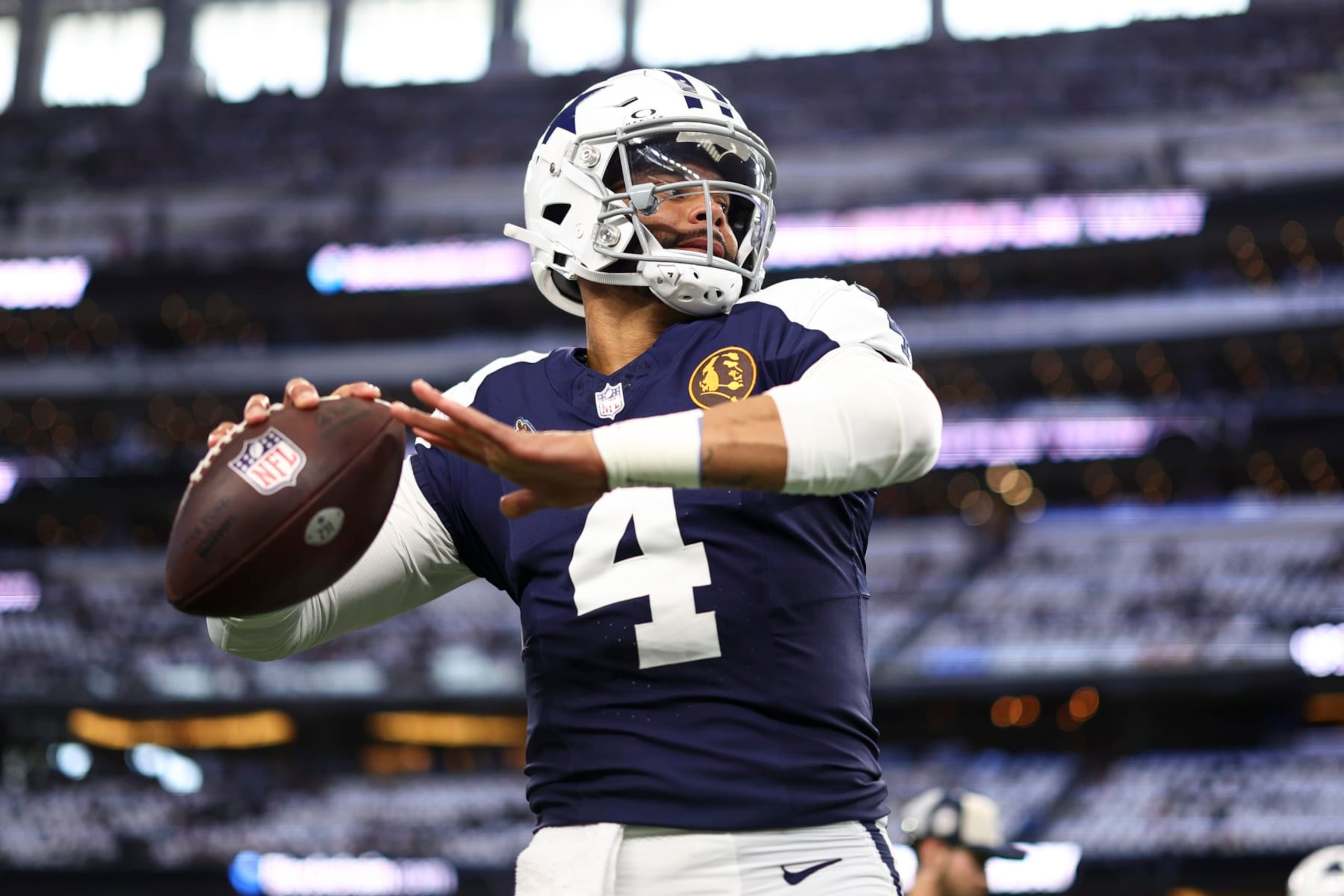 ARLINGTON, TX - NOVEMBER 23: Dak Prescott #4 of the Dallas Cowboys warms up prior to an NFL football game against the Washington Commanders at AT&T Stadium on November 23, 2023 in Arlington, Texas. (Photo by Kevin Sabitus/Getty Images)