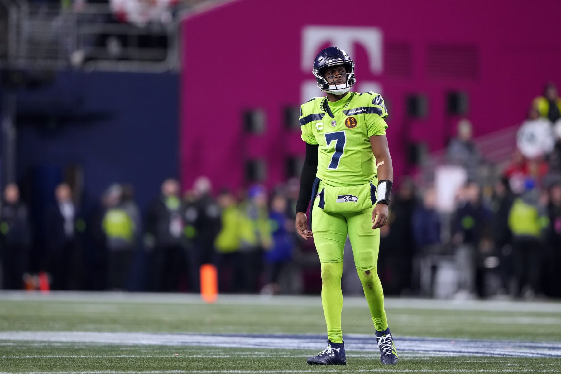 Seattle Seahawks quarterback Geno Smith walks off the field during the first half of an NFL football game against the San Francisco 49ers, Thursday, Nov. 23, 2023, in Seattle. (AP Photo/Lindsey Wassen)