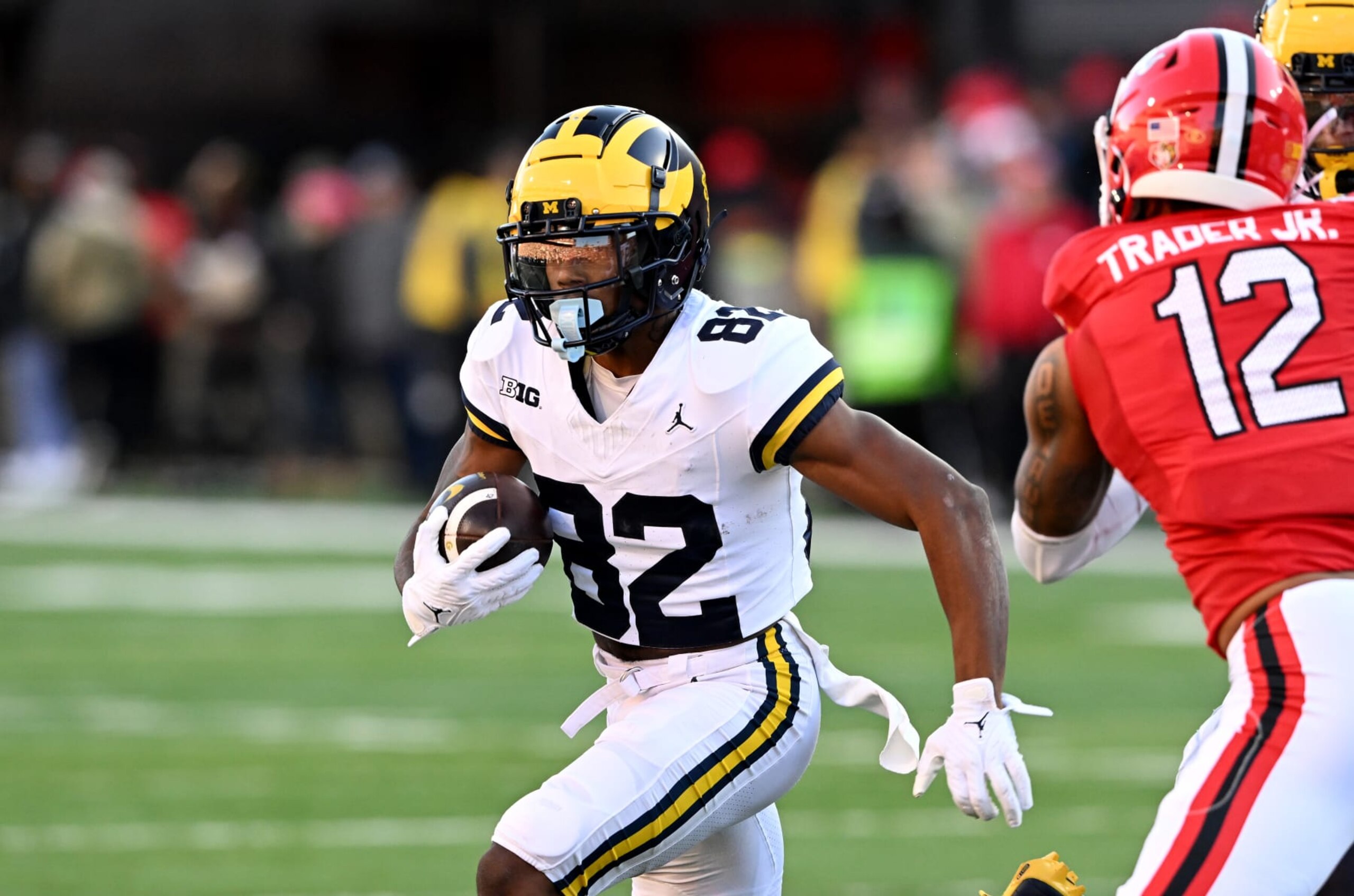 COLLEGE PARK, MARYLAND - NOVEMBER 18: Semaj Morgan #82 of the Michigan Wolverines rushes for a touchdown in the fourth quarter against the Maryland Terrapins at SECU Stadium on November 18, 2023 in College Park, Maryland. COLLEGE PARK, MARYLAND - NOVEMBER 18: Semaj Morgan #82 of the Michigan Wolverines rushes for a touchdown in the fourth quarter against the Maryland Terrapins at SECU Stadium on November 18, 2023 in College Park, Maryland.