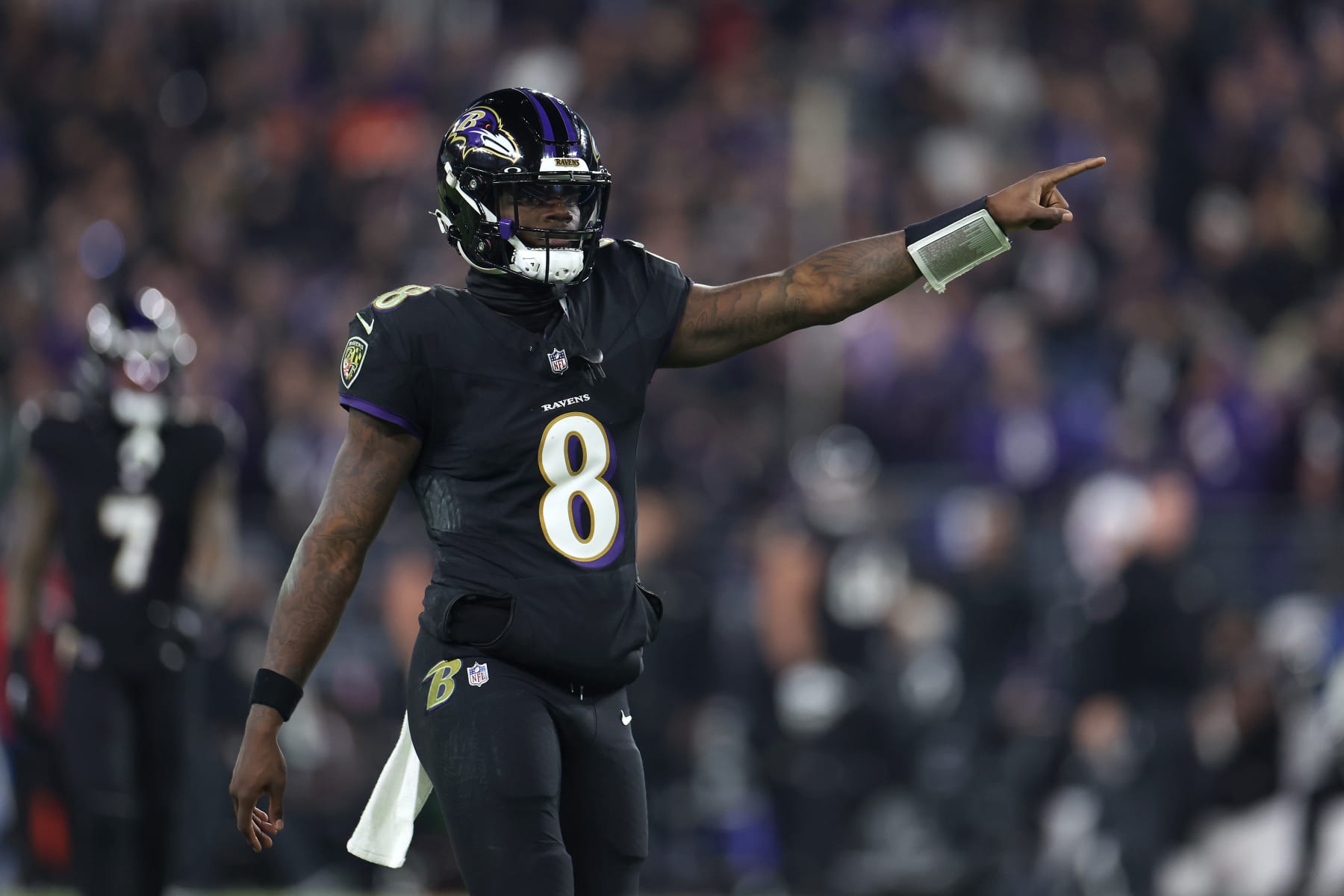 BALTIMORE, MARYLAND - NOVEMBER 16: Quarterback Lamar Jackson #8 of the Baltimore Ravens celebrates throwing a second half first down pass against the Cincinnati Bengals at M&T Bank Stadium on November 16, 2023 in Baltimore, Maryland. (Photo by Rob Carr/Getty Images)