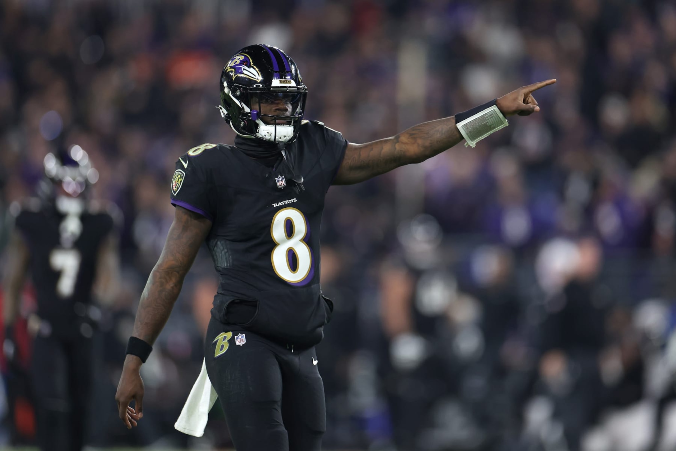 BALTIMORE, MARYLAND - NOVEMBER 16: Quarterback Lamar Jackson #8 of the Baltimore Ravens celebrates throwing a second half first down pass against the Cincinnati Bengals at M&T Bank Stadium on November 16, 2023 in Baltimore, Maryland. (Photo by Rob Carr/Getty Images)