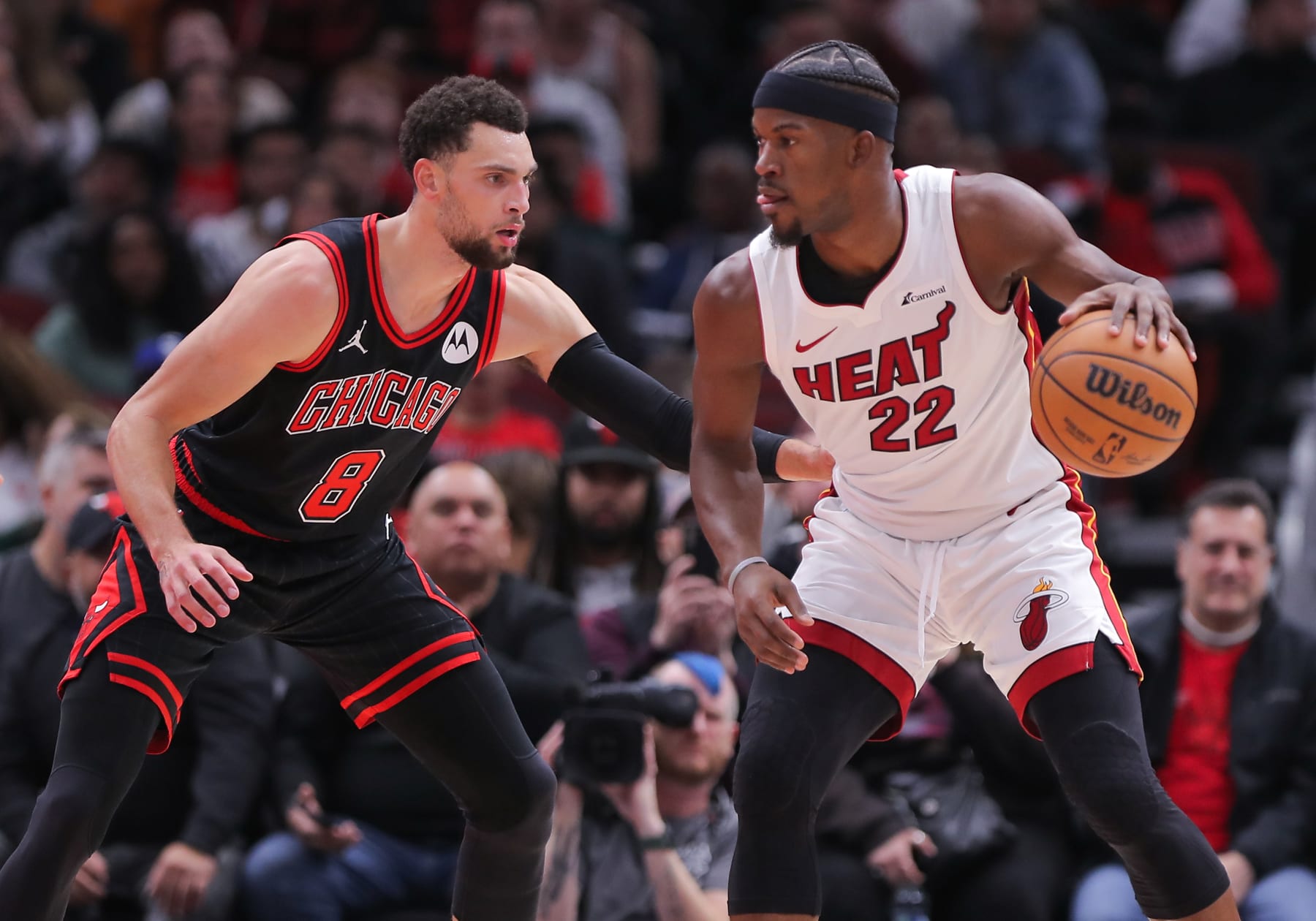 CHICAGO, IL - NOVEMBER 18: Zach LaVine #8 of the Chicago Bulls posts up against Jimmy Butler #22 of the Miami Heat during the first half at the United Center on November 18, 2023 in Chicago, Illinois. (Photo by Melissa Tamez/Icon Sportswire via Getty Images)