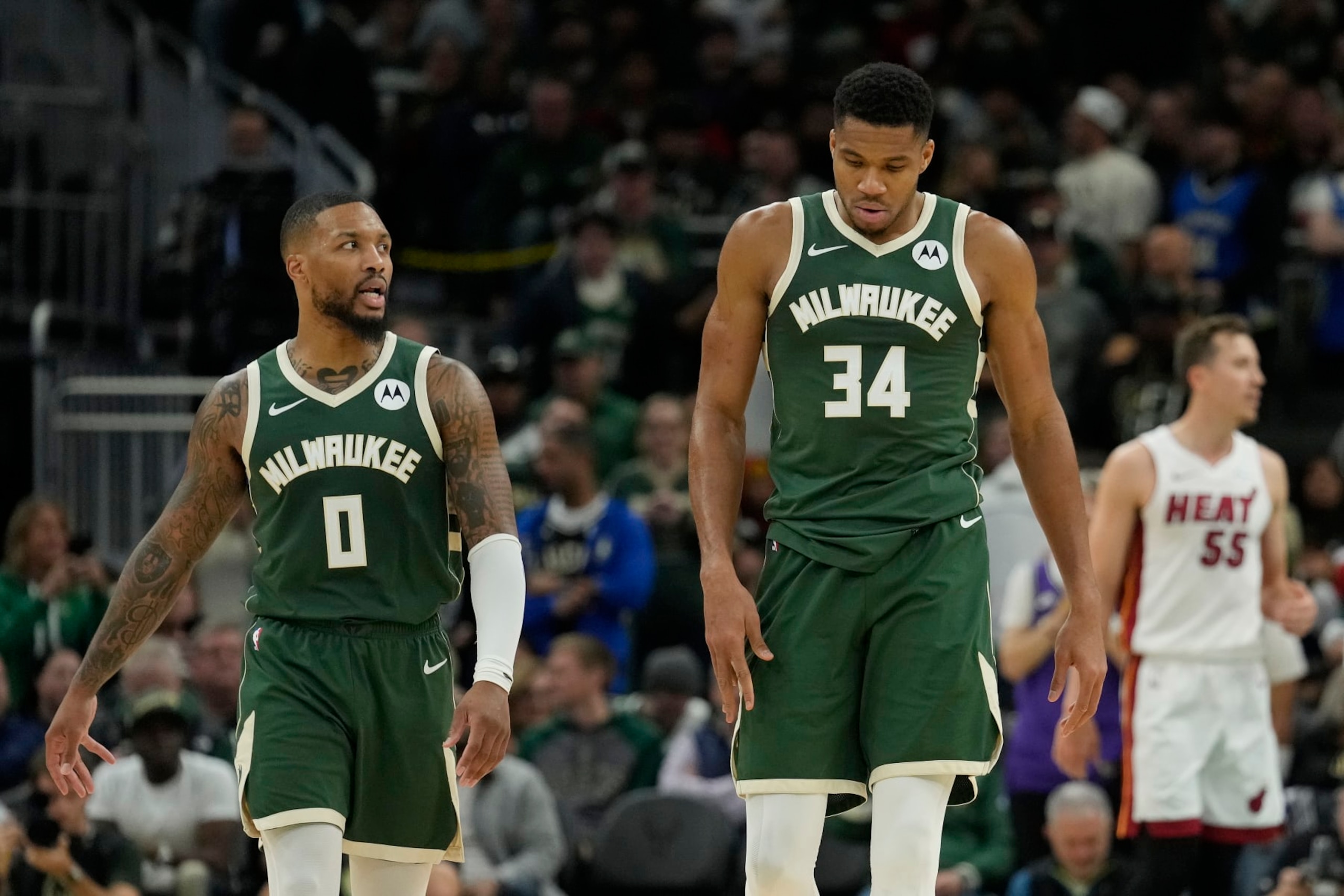 MILWAUKEE, WISCONSIN - OCTOBER 30: Damian Lillard #0 and Giannis Antetokounmpo #34 of the Milwaukee Bucks look on during the second half against the Miami Heat at Fiserv Forum on October 30, 2023 in Milwaukee, Wisconsin. NOTE TO USER: User expressly acknowledges and agrees that, by downloading and or using this photograph, User is consenting to the terms and conditions of the Getty Images License Agreement. (Photo by Patrick McDermott/Getty Images) MILWAUKEE, WISCONSIN - OCTOBER 30: Damian Lillard #0 and Giannis Antetokounmpo #34 of the Milwaukee Bucks look on during the second half against the Miami Heat at Fiserv Forum on October 30, 2023 in Milwaukee, Wisconsin. NOTE TO USER: User expressly acknowledges and agrees that, by downloading and or using this photograph, User is consenting to the terms and conditions of the Getty Images License Agreement. (Photo by Patrick McDermott/Getty Images)