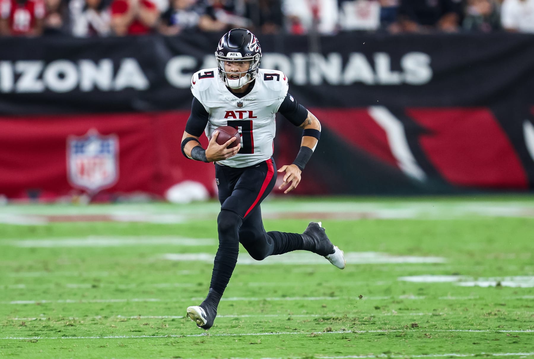 GLENDALE, ARIZONA - NOVEMBER 12: Desmond Ridder #9 of the Atlanta Falcons runs the ball during the fourth quarter of a game against the Arizona Cardinals at State Farm Stadium on November 12, 2023 in Glendale, Arizona. (Photo by Mike Christy/Getty Images)