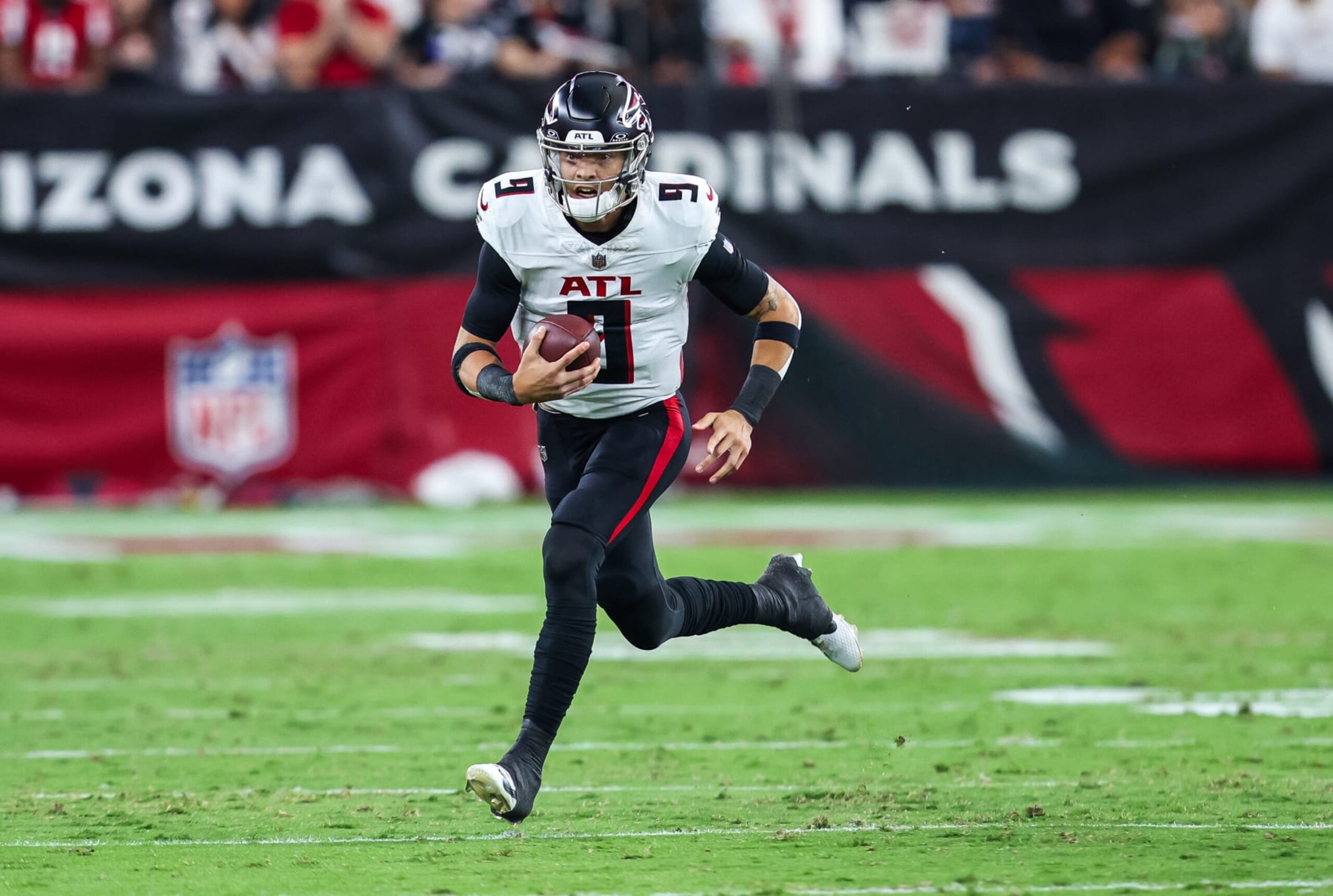 GLENDALE, ARIZONA - NOVEMBER 12: Desmond Ridder #9 of the Atlanta Falcons runs the ball during the fourth quarter of a game against the Arizona Cardinals at State Farm Stadium on November 12, 2023 in Glendale, Arizona. (Photo by Mike Christy/Getty Images)