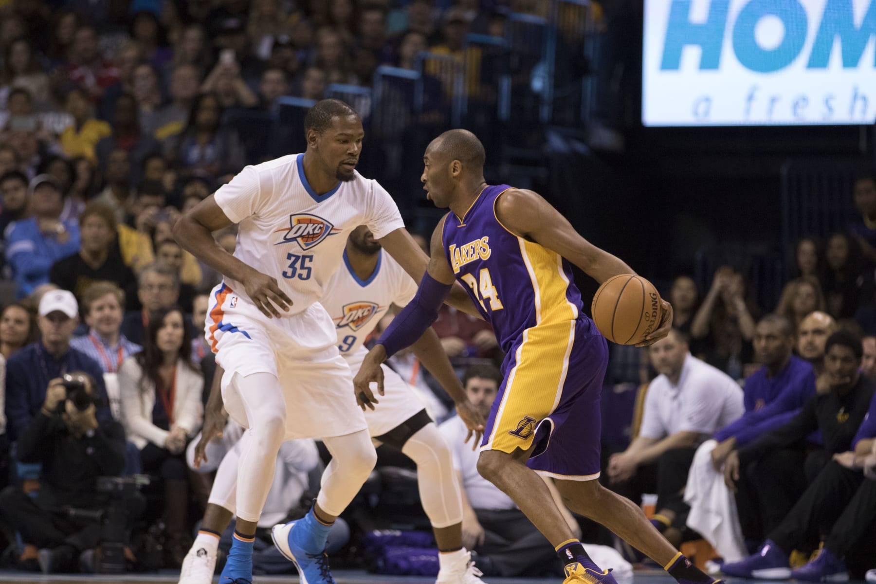 OKLAHOMA CITY, OK - APRIL 11: Kobe Bryant #24 of the Los Angeles Lakers drives around Kevin Durant #35 of the Oklahoma City Thunder during a NBA game at the Chesapeake Energy Arena on April 11, 2016 in Oklahoma City, Oklahoma. NOTE TO USER: User expressly acknowledges and agrees that, by downloading and or using this photograph, User is consenting to the terms and conditions of the Getty Images License Agreement. (Photo by J Pat Carter/Getty Images)