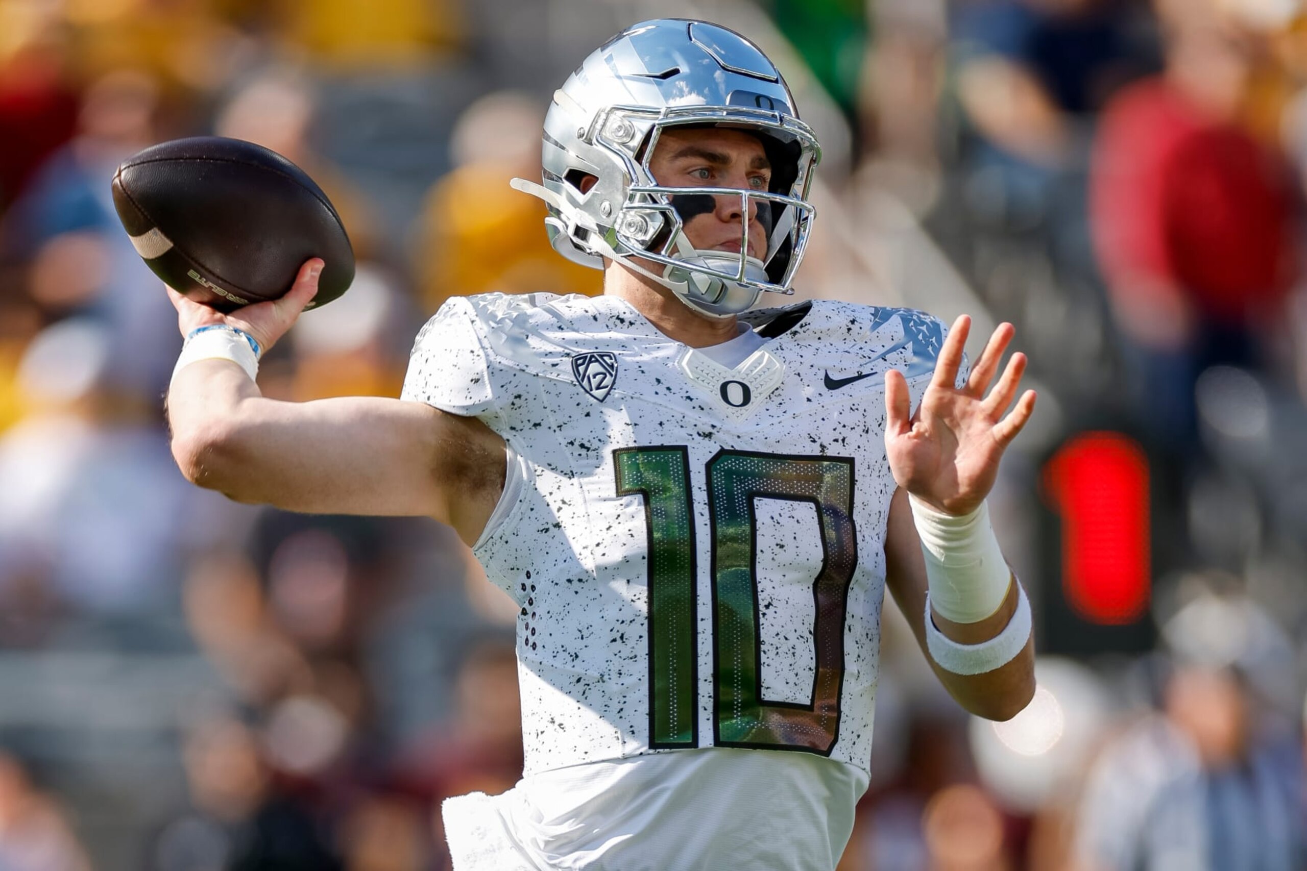TEMPE, ARIZONA - NOVEMBER 18: Bo Nix #10 of the Oregon Ducks passes the ball in the first quarter during a game against the Arizona State Sun Devils at Mountain America Stadium on November 18, 2023 in Tempe, Arizona. (Photo by Brandon Sloter/Image Of Sport/Getty Images)
