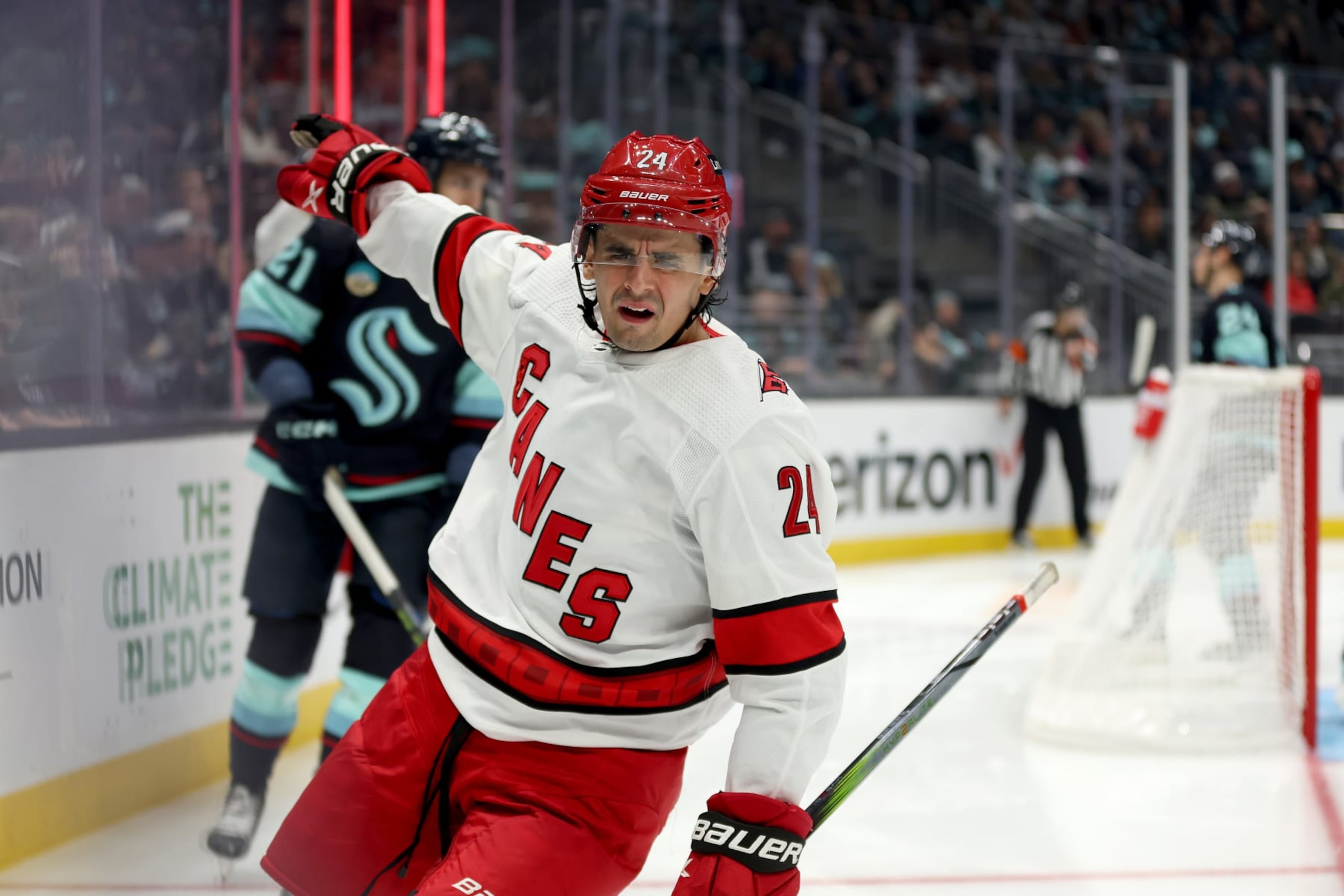 SEATTLE, WASHINGTON - OCTOBER 19: Seth Jarvis #24 of the Carolina Hurricanes celebrates his goal against the Seattle Kraken during the third period at Climate Pledge Arena on October 19, 2023 in Seattle, Washington. (Photo by Steph Chambers/Getty Images)