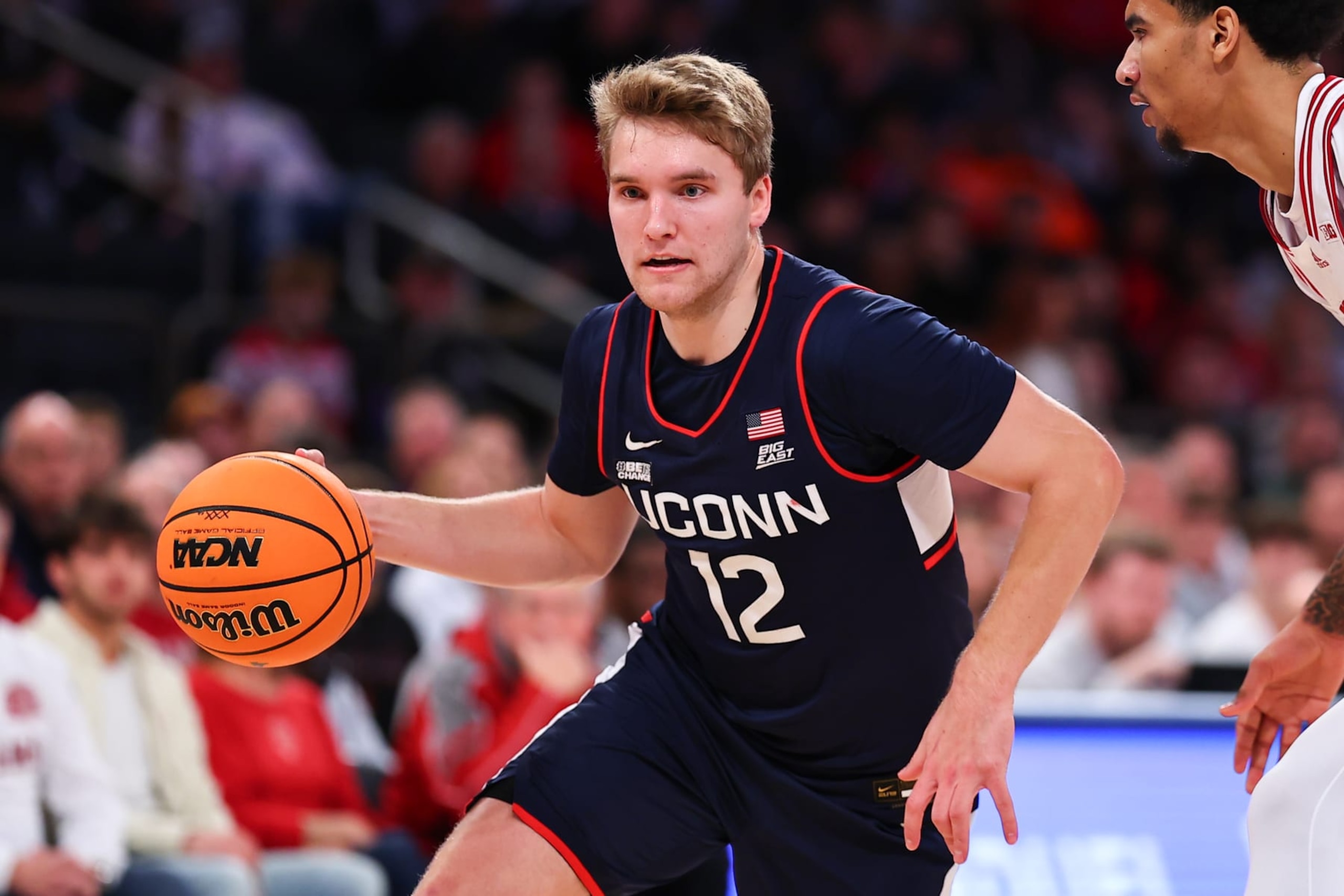 NEW YORK, NY - NOVEMBER 19:  Cam Spencer #12 of the Connecticut Huskies during the Empire Classic college basketball game against the Indiana Hoosiers on November 19, 2023 at Madison Square Garden in New York, New York,  (Photo by Rich Graessle/Icon Sportswire via Getty Images)