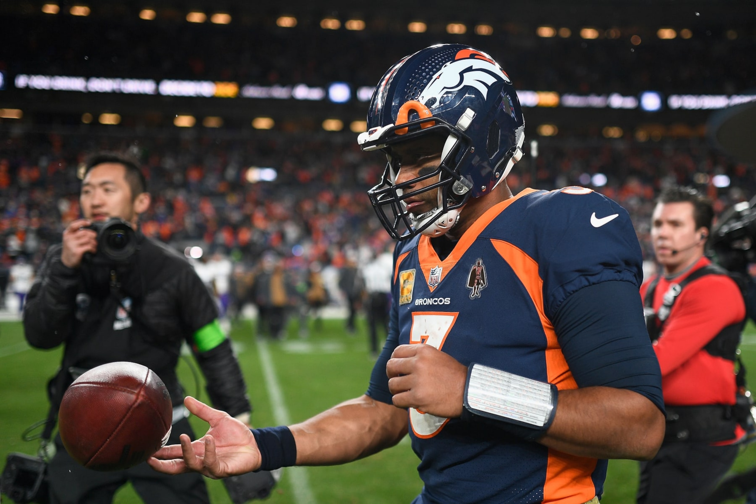 DENVER, COLORADO - NOVEMBER 19: Quarterback Russell Wilson #3 of the Denver Broncos reacts after defeating the Minnesota Vikings in the NFL game at Empower Field At Mile High on November 19, 2023 in Denver, Colorado. The Broncos defeated the Vikings 21-20.  (Photo by Dustin Bradford/Getty Images)